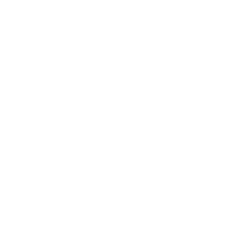 A woman with short, curly black hair wearing a yellow blazer, white top, and jeans holding an orange iPad and smiling.