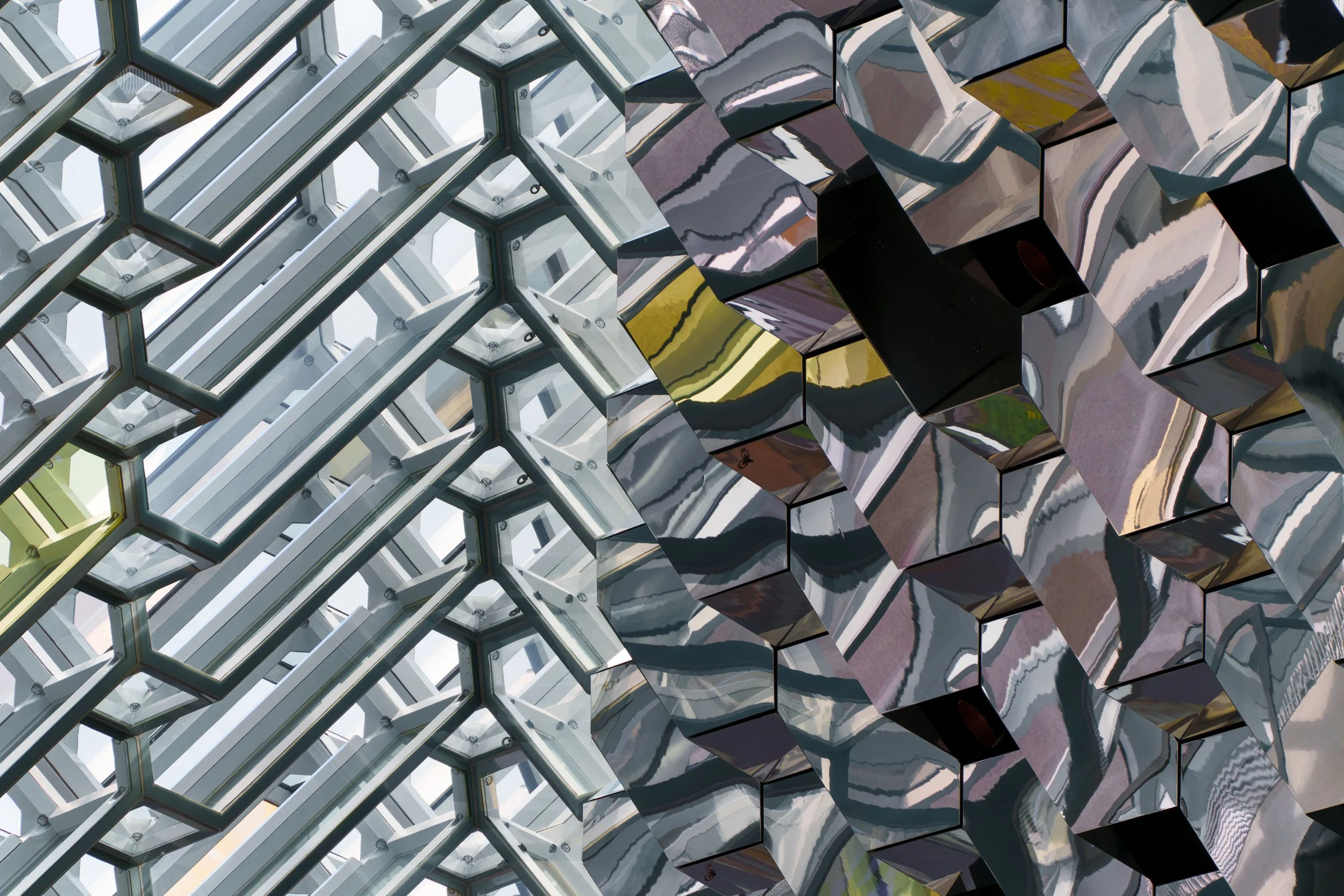 Abstract mirrored architectural collage combining glass ceiling panels with faceted reflective geometric forms
