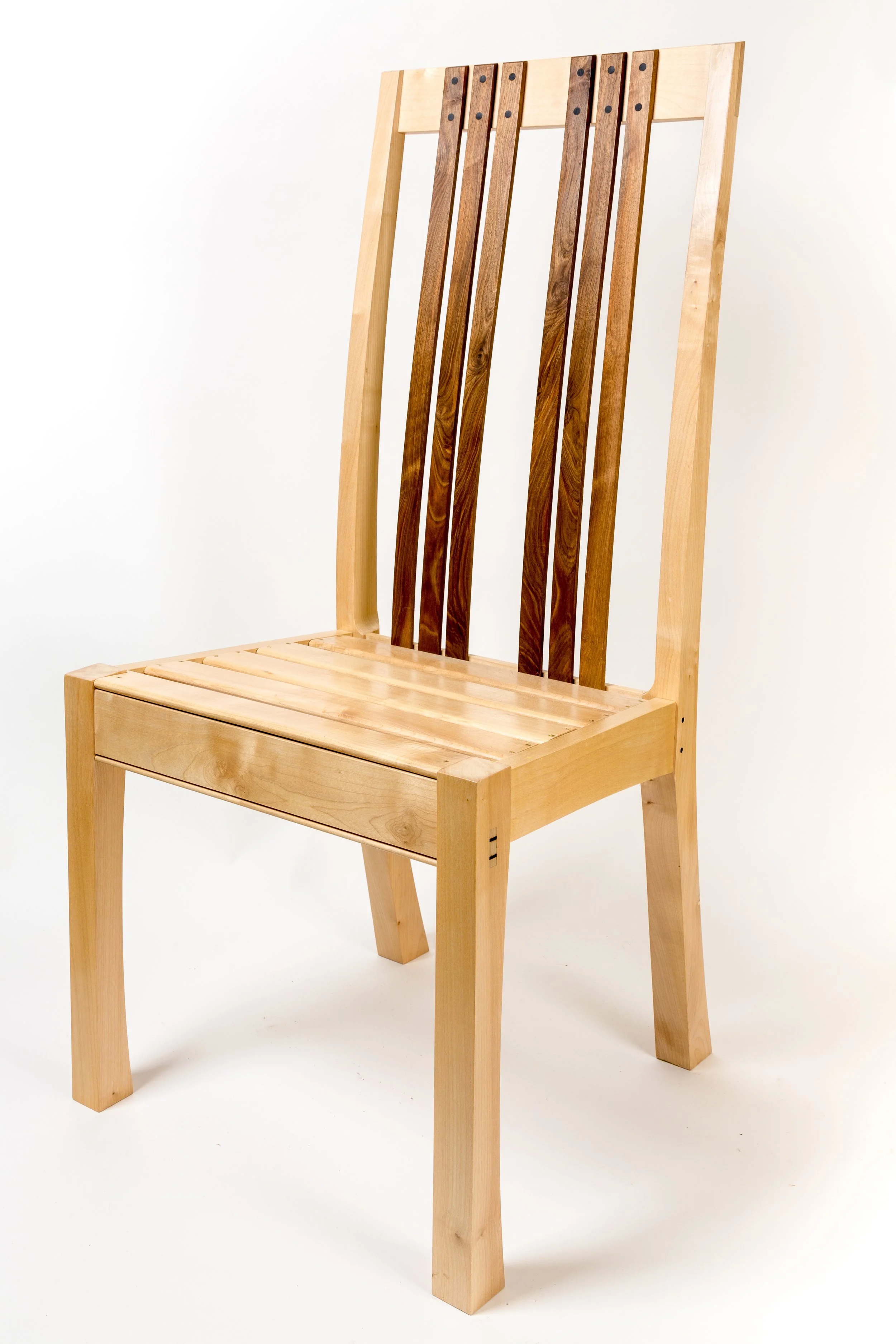 A wooden chair with a slatted backrest and seat, featuring a combination of light and dark wood tones, against a plain white background.