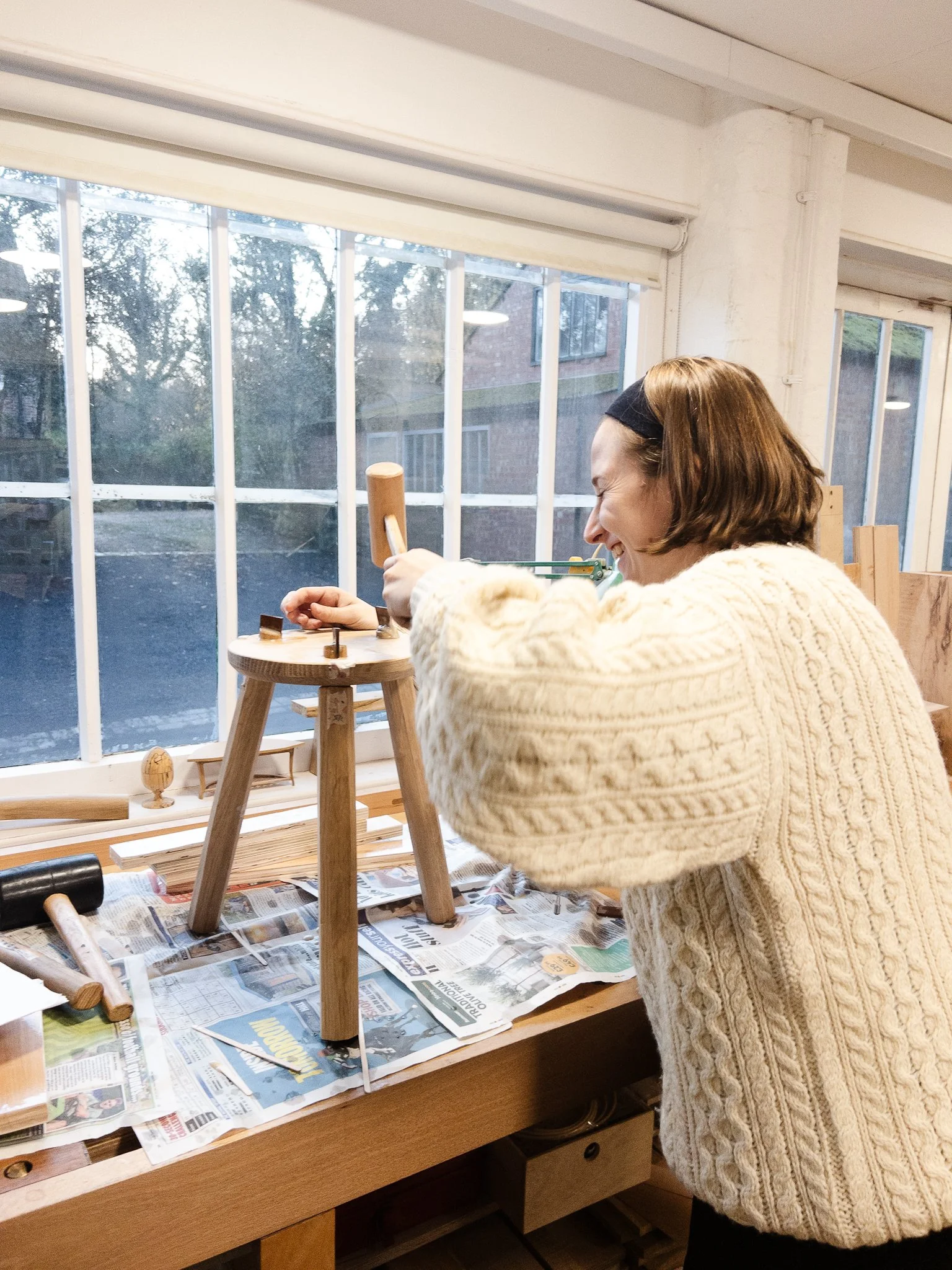 Caterina Lay Montoya Milking Stool student hammering tenons.JPG