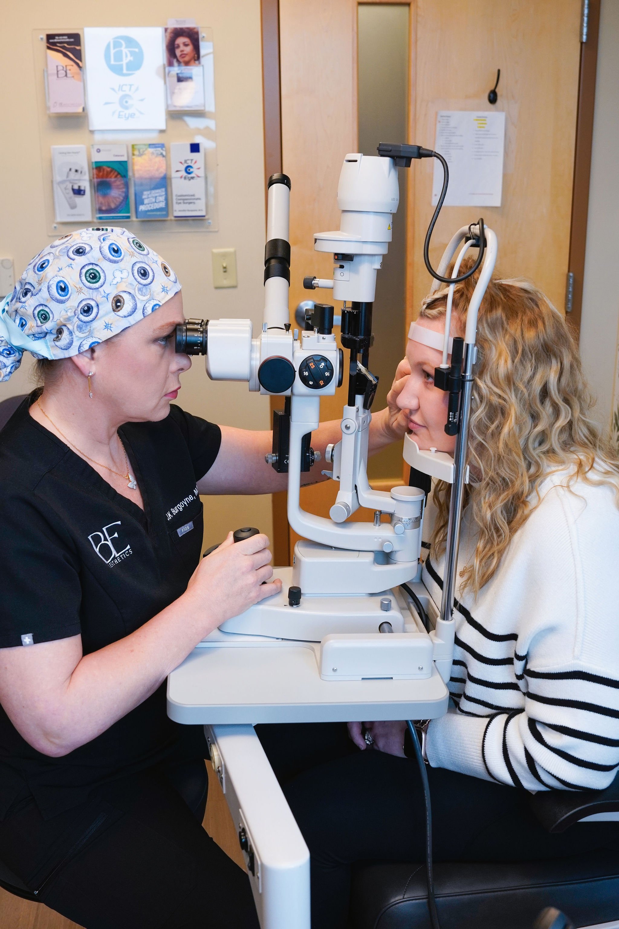 Patient undergoing eye and facial analysis at Kansas med spa