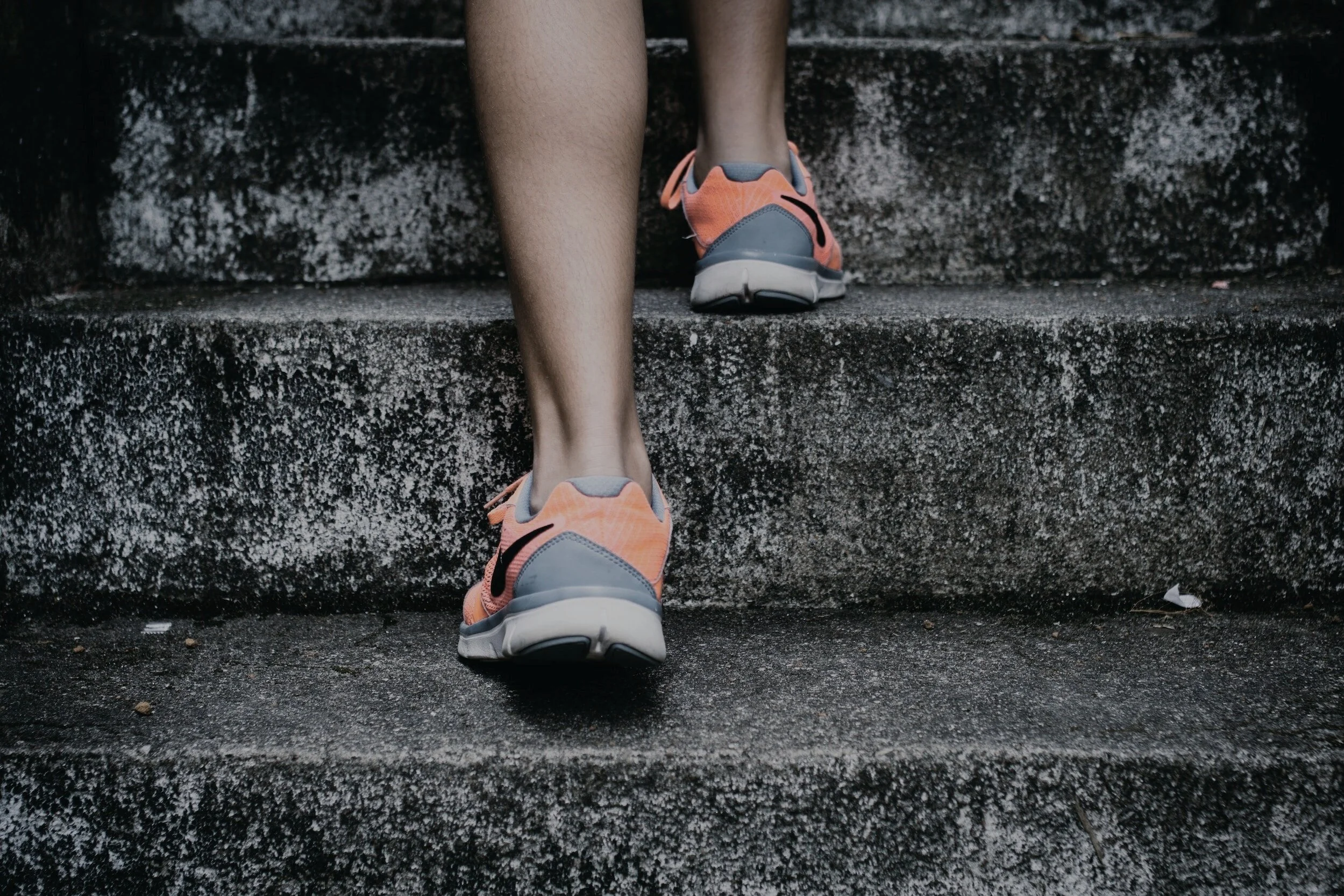 Staircase with person stepping up