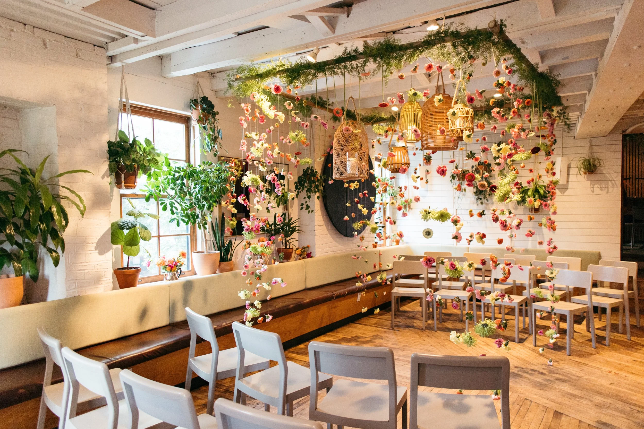 Chuppah made of flowers and wicker lanterns