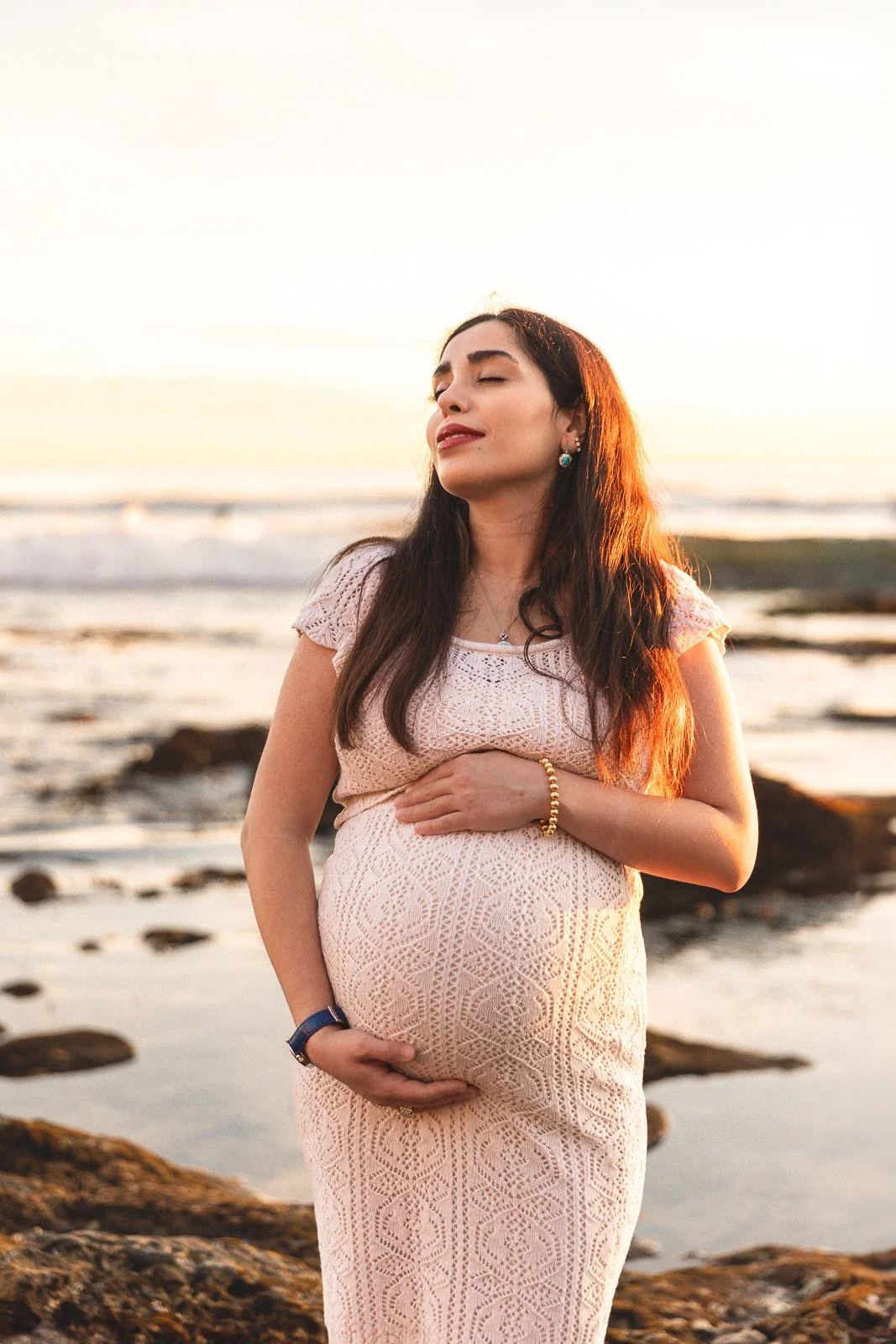 Portrait at Heisler Park in Laguna Beach near the rocks and shoreline, featured in this photoshoot location guide.