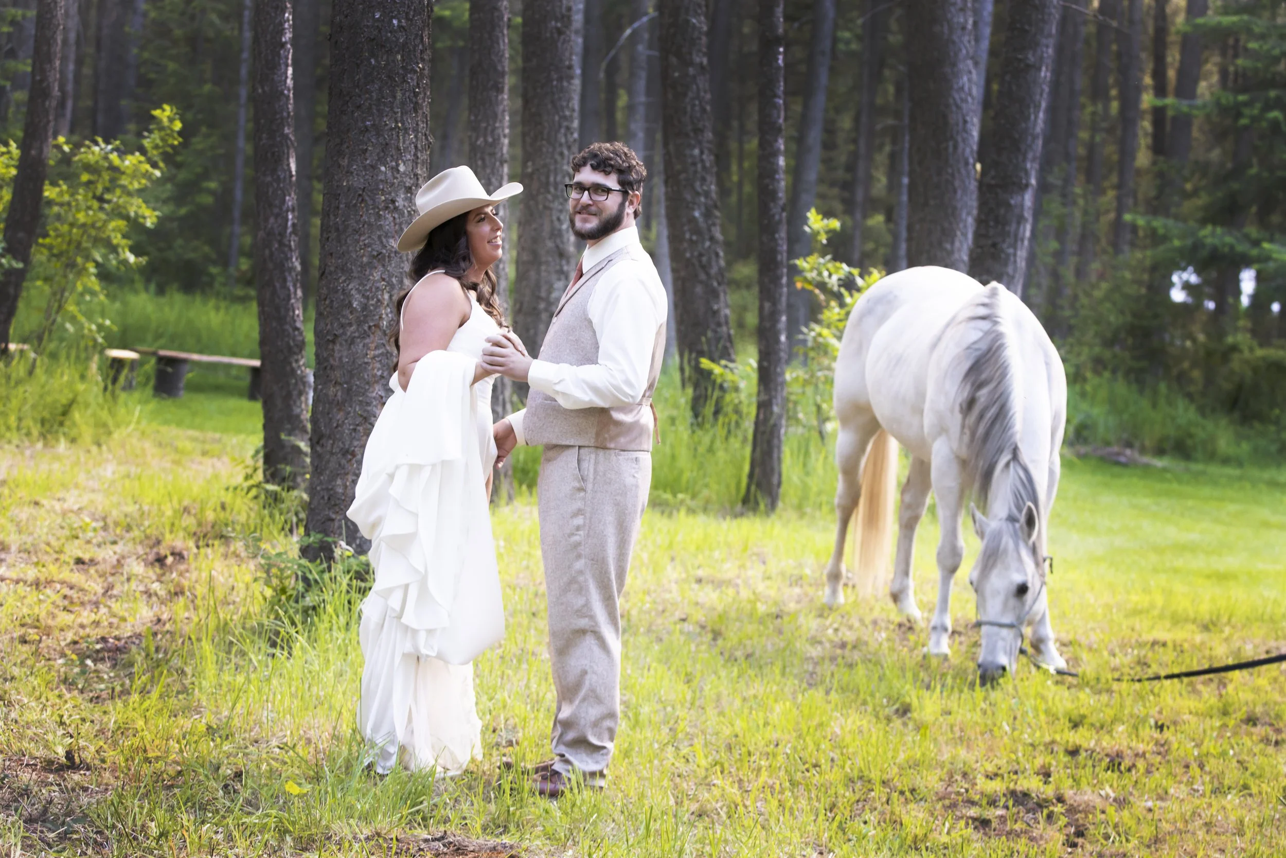 2 People and a Horse Get Married at the Gathering Porch aDeer Park WA wedding venue