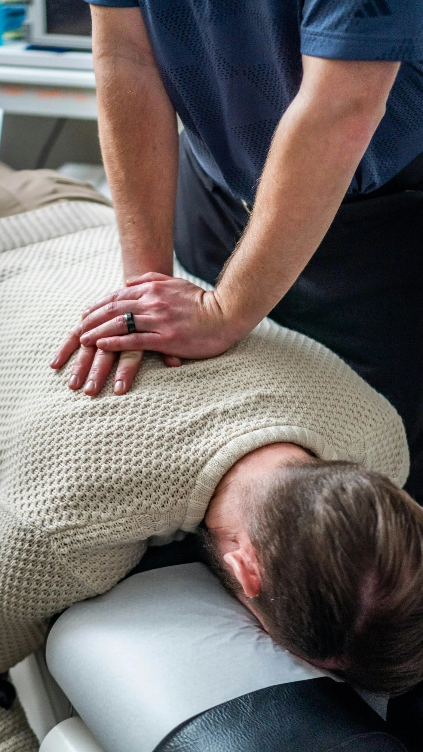 Chiropractic adjustment for back pain, shoulder pain, or neck pain in the Upper Peninsula.
