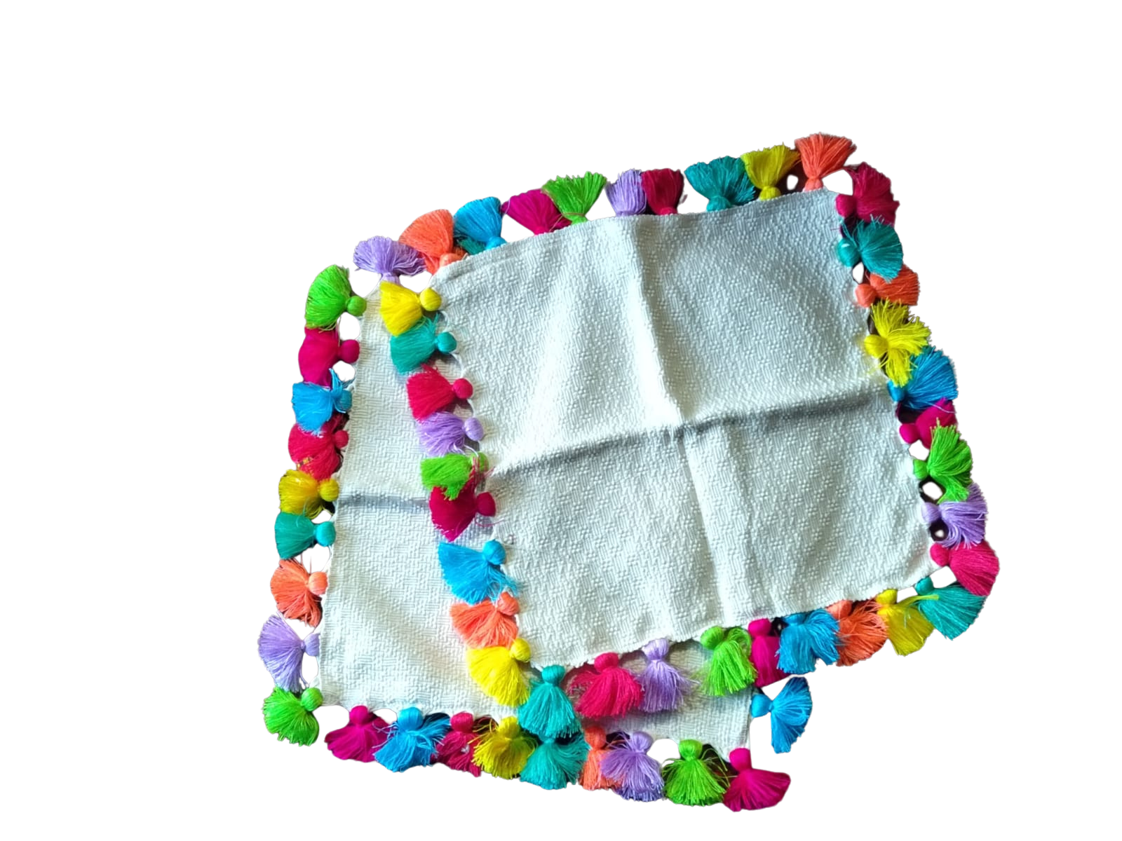 Pair of white cushion covers with pompoms