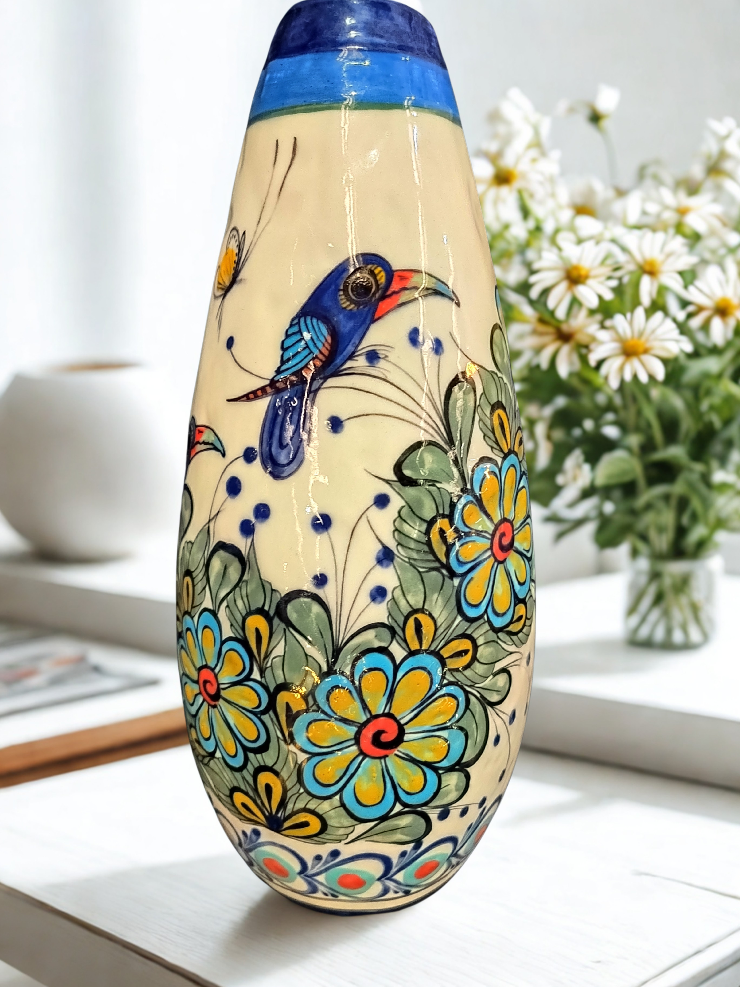 Ceramic vase from Guatemala with toucans and hummingbirds handpainted all around