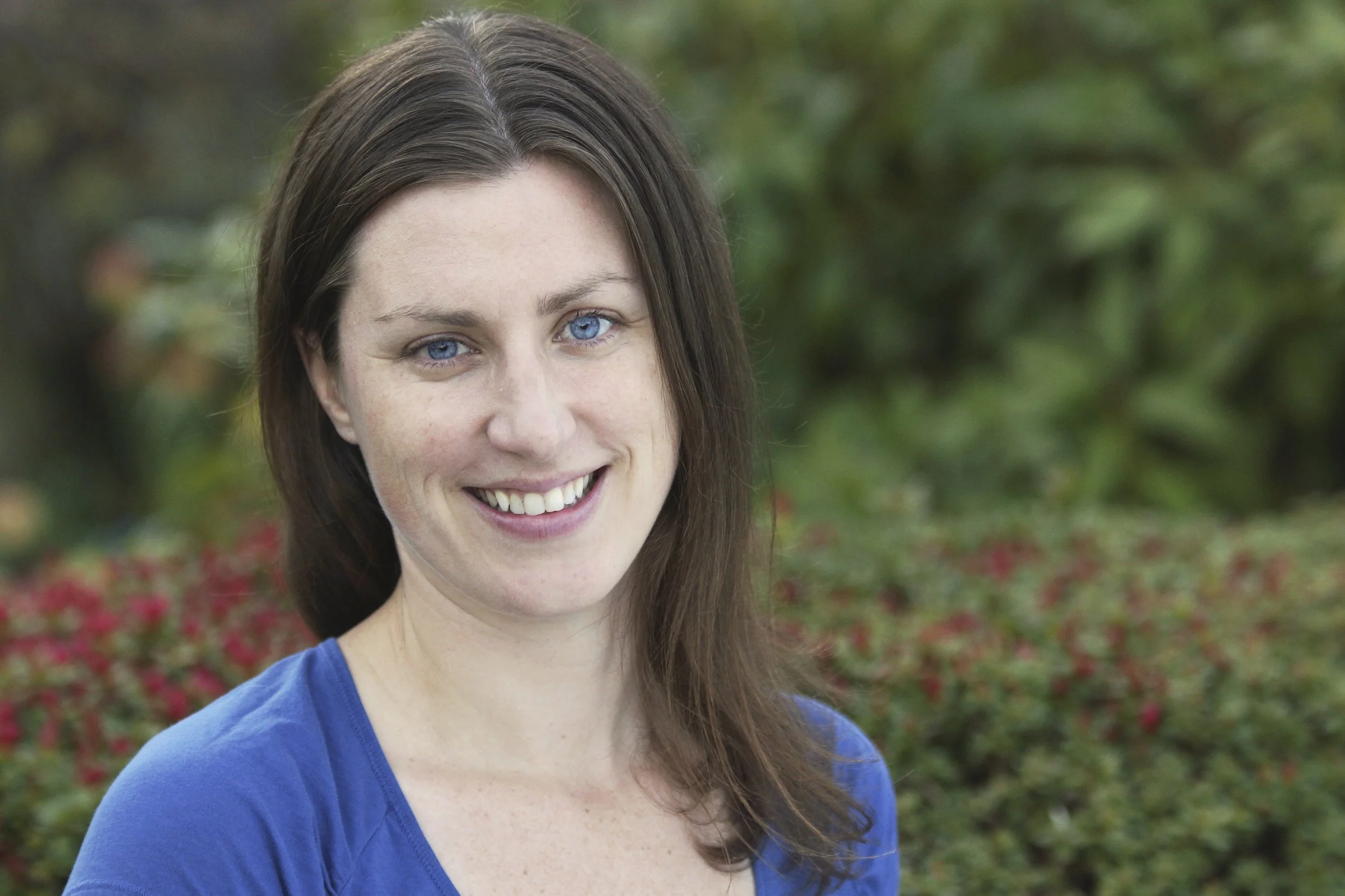 Copy of Paige Olmsted_Headshot_Colour.jpg