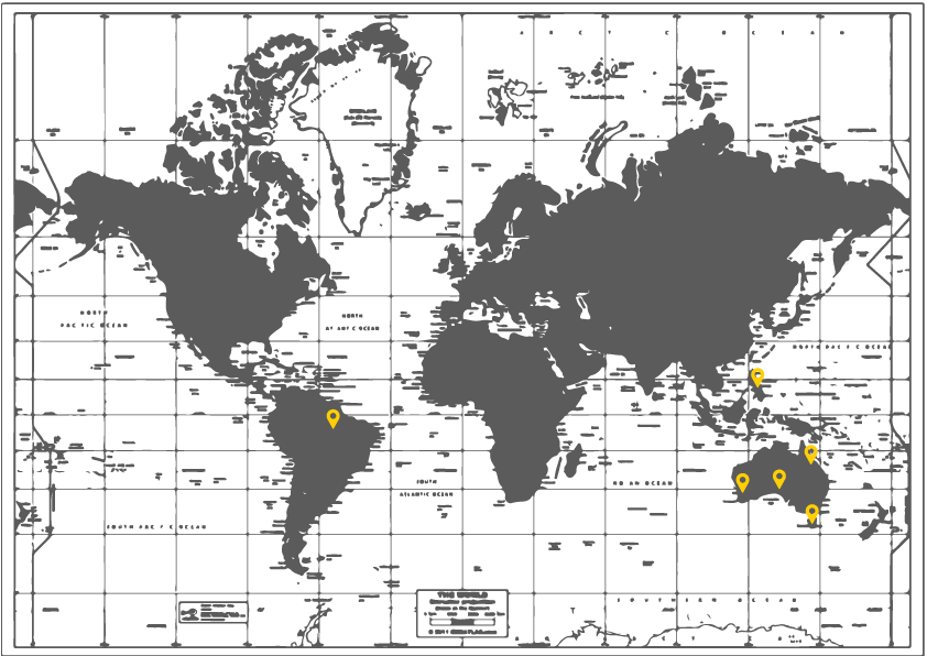 World map overlaid with black background and gray continents, with five yellow location markers over South America and Southeast Asia.
