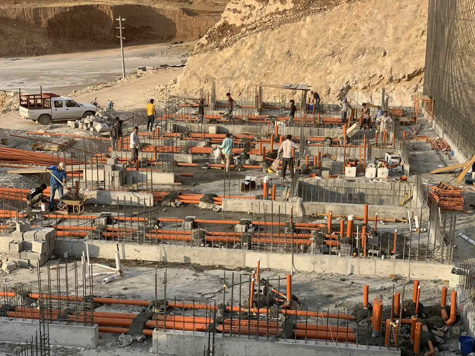Oranssi technician working on a roof project