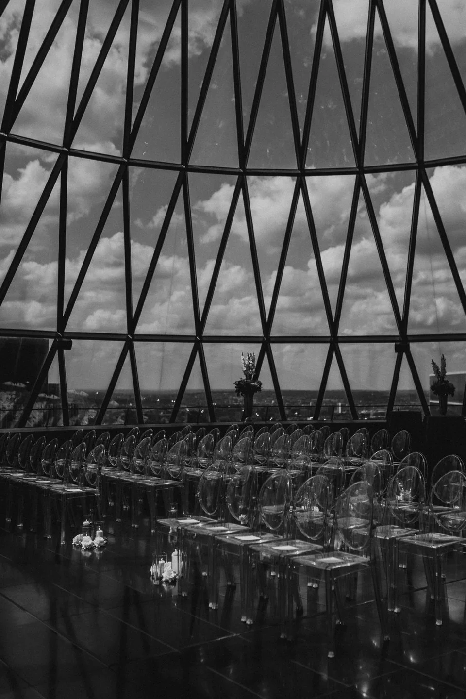 Black and white wedding ceremony seating in a graphic editorial composition