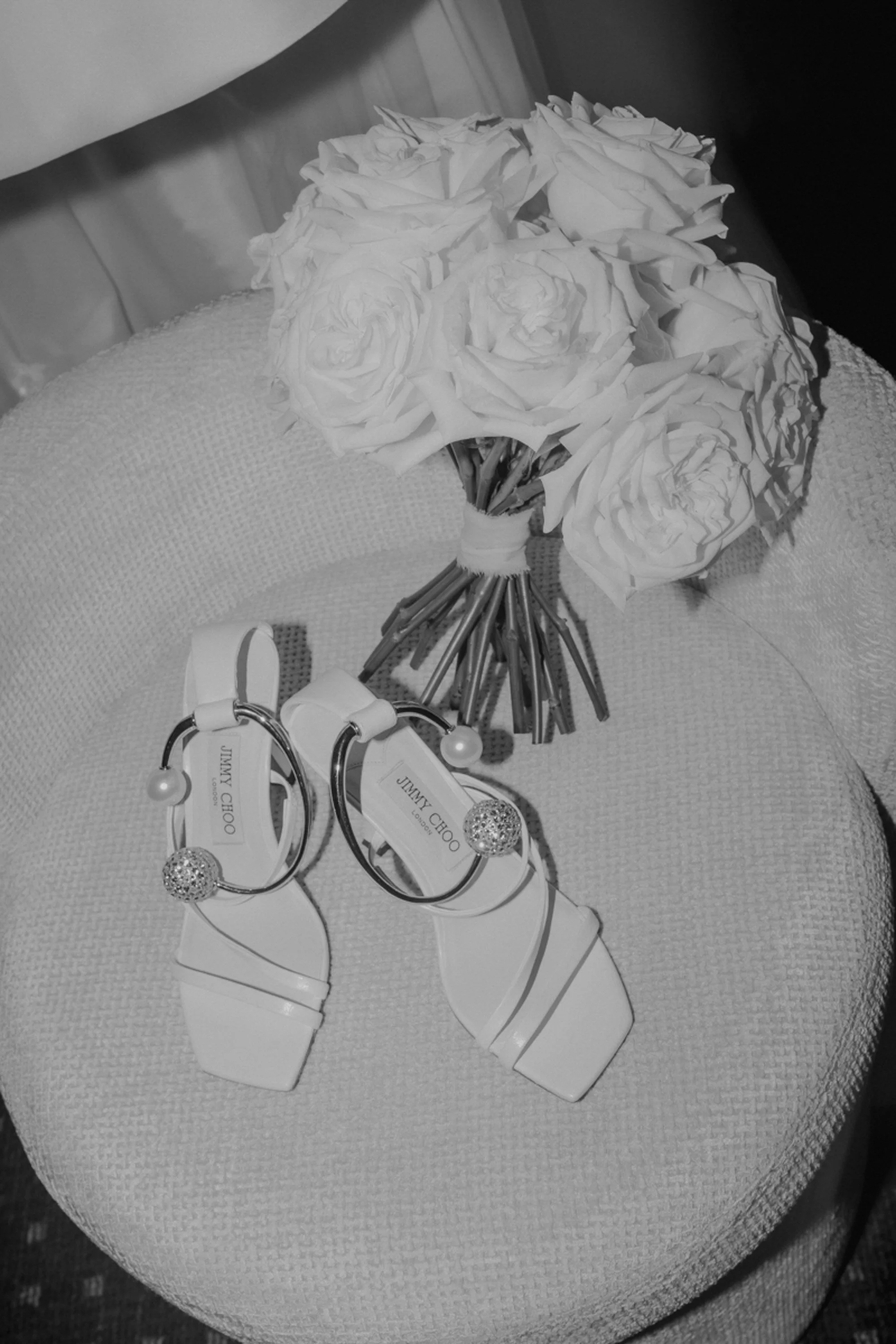 Jimmy Choo bridal shoes with white wedding flowers