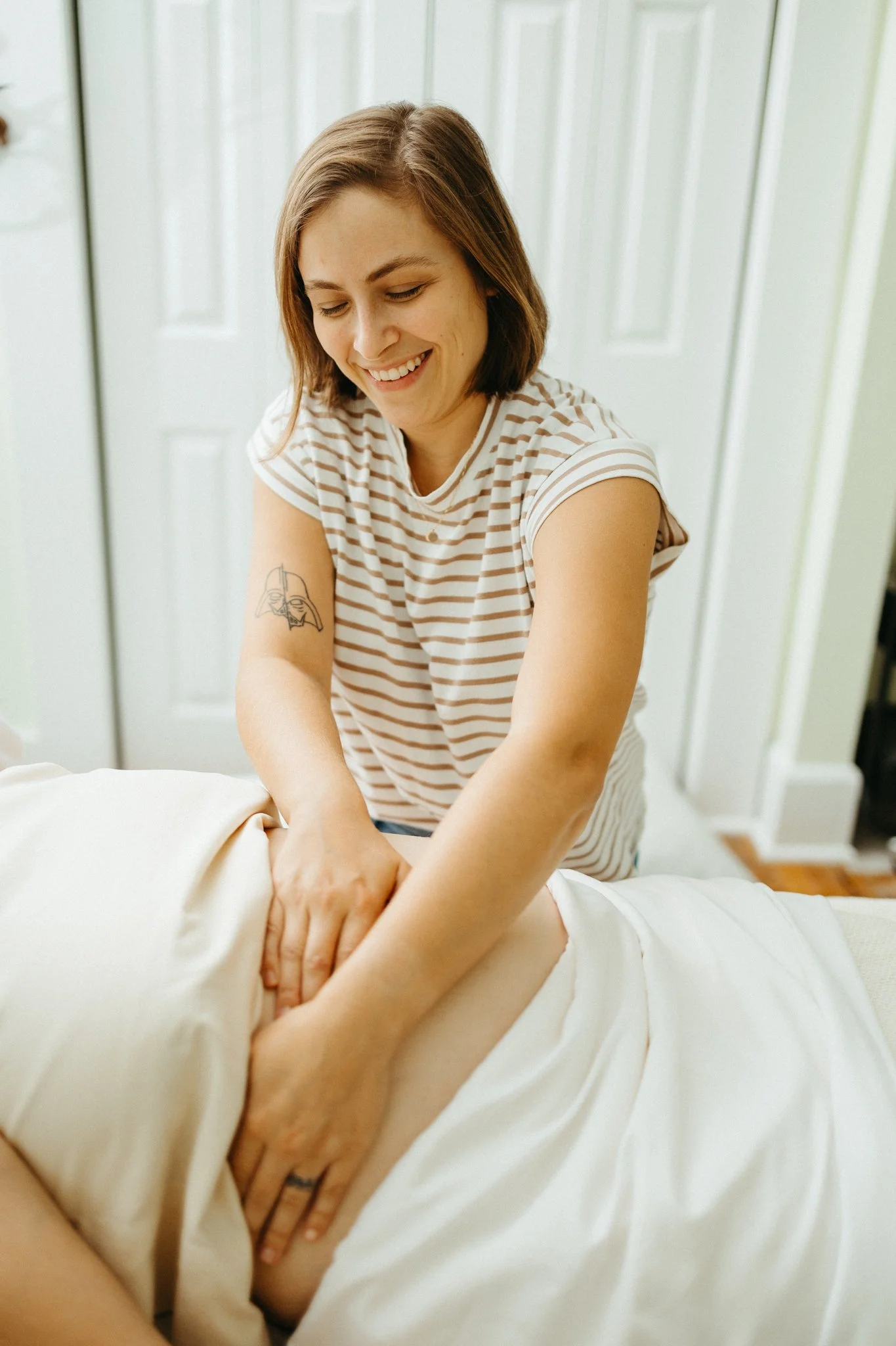 Shannon giving an abdominal massage during pregnancy