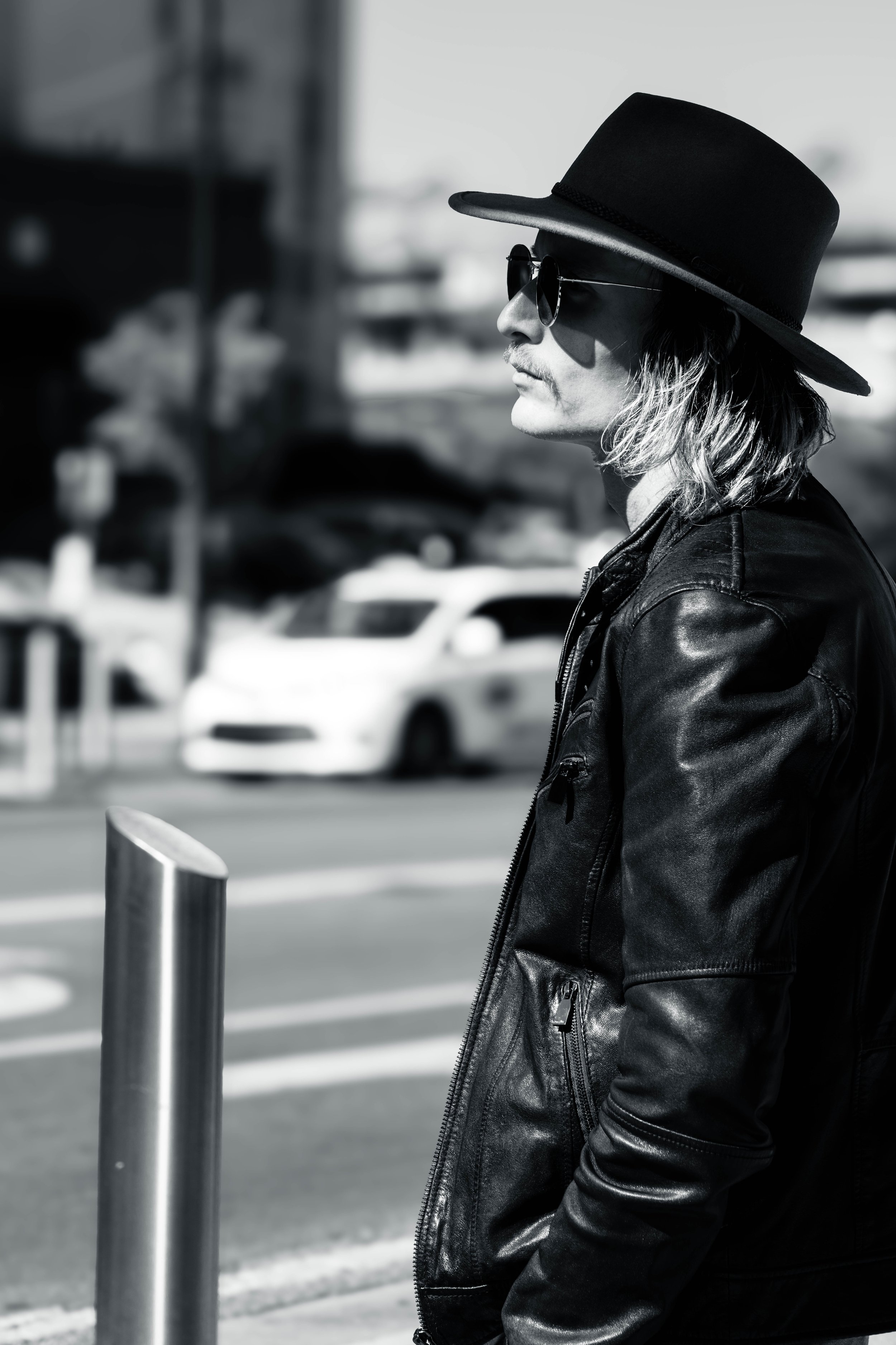 Discover raw street portraiture from the Highway Collection. High-contrast black and white fine art photo printed on museum-grade archival paper.