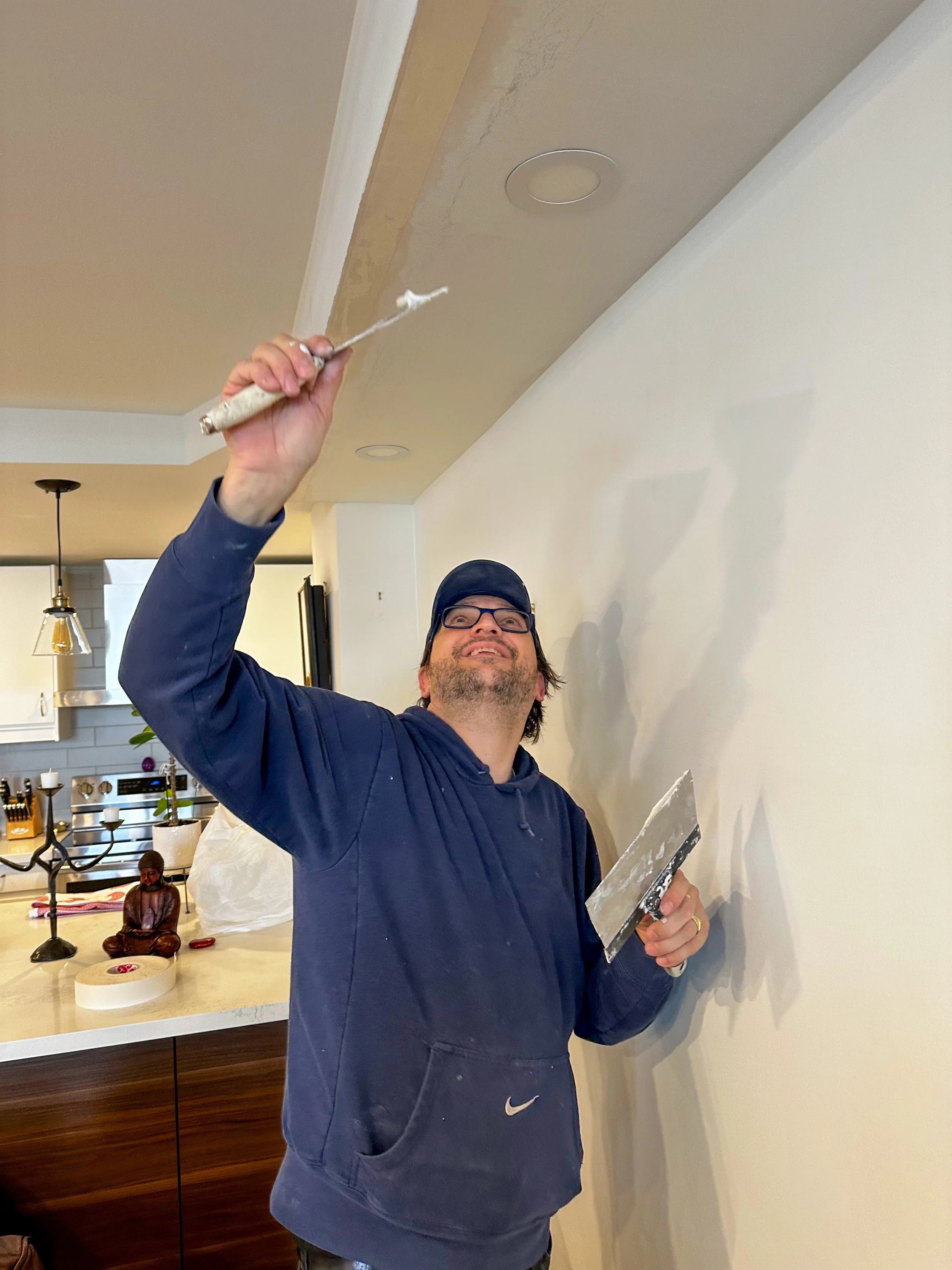 Plaster being applied on wall renovation