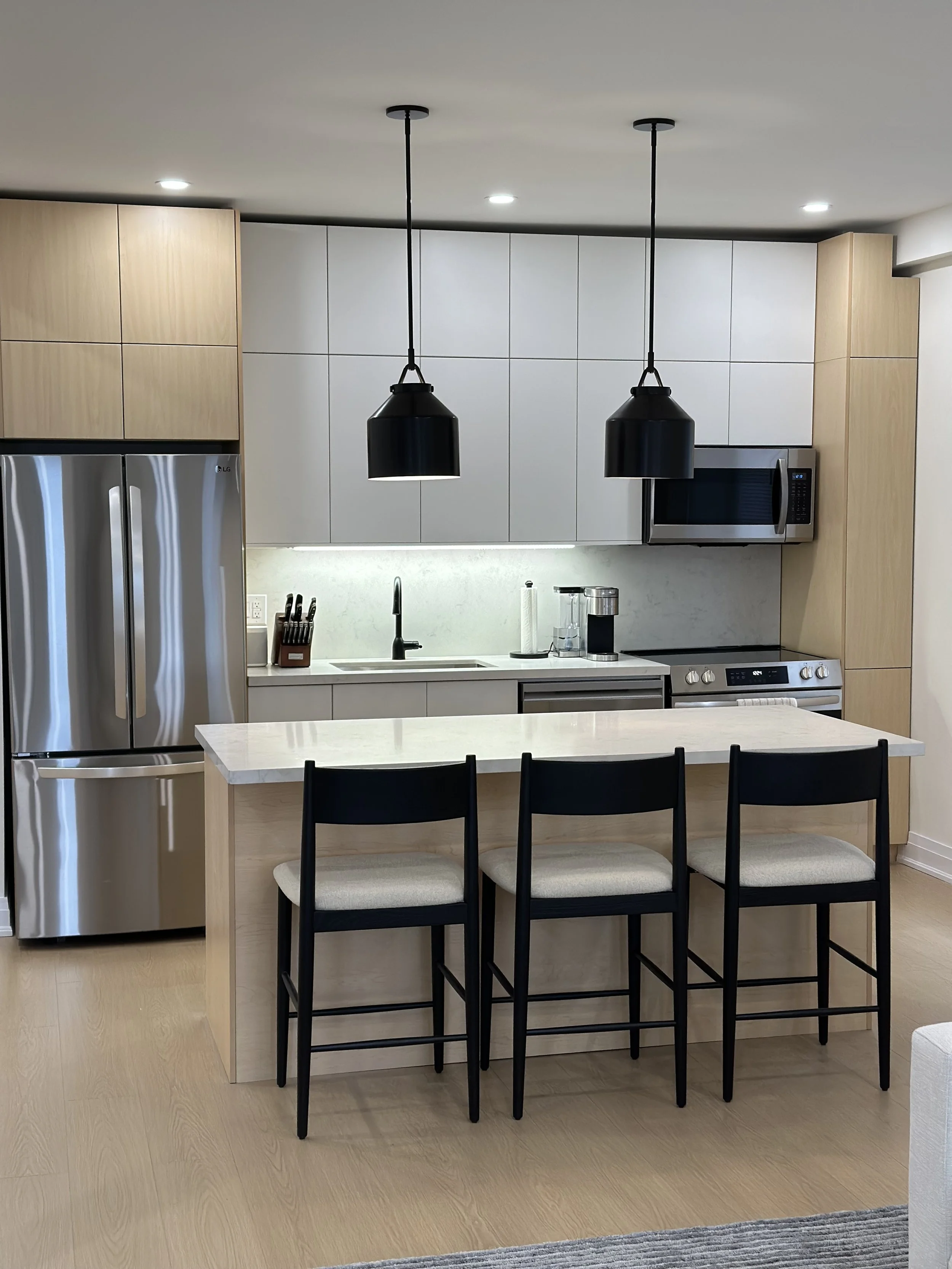 Kitchen inside a newly remodelled house, matching flooring and cabinets