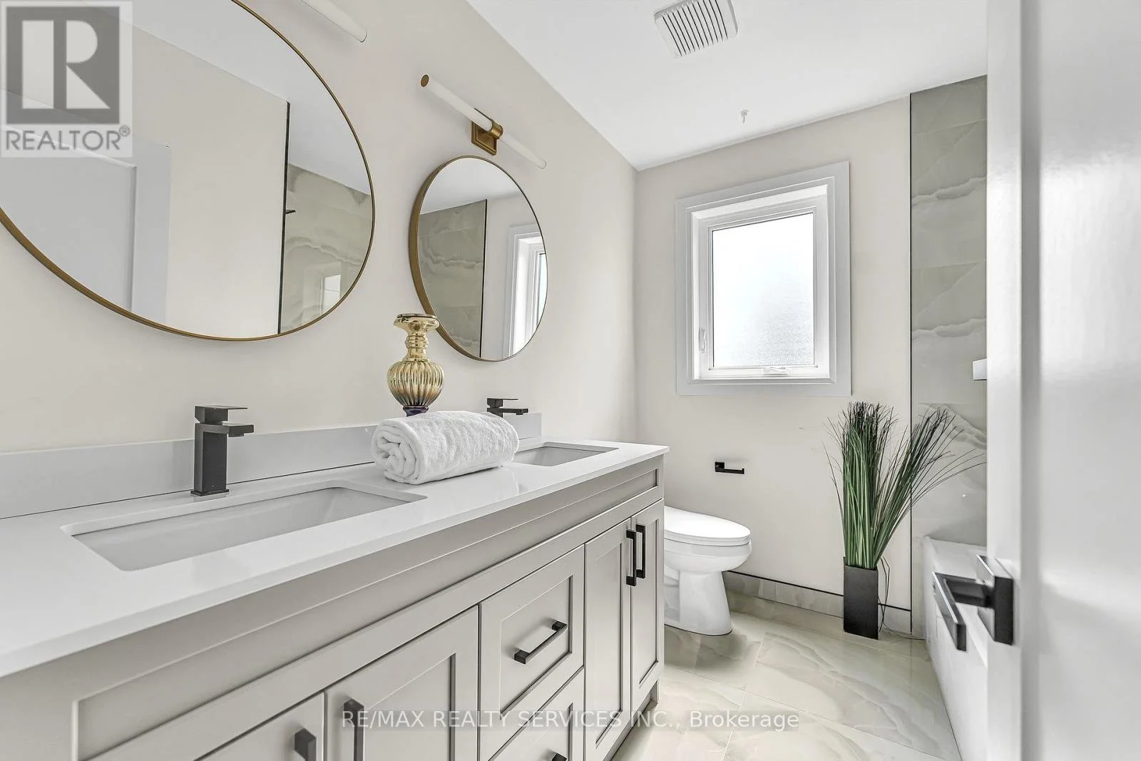 New vanity and mirrors in renovated house