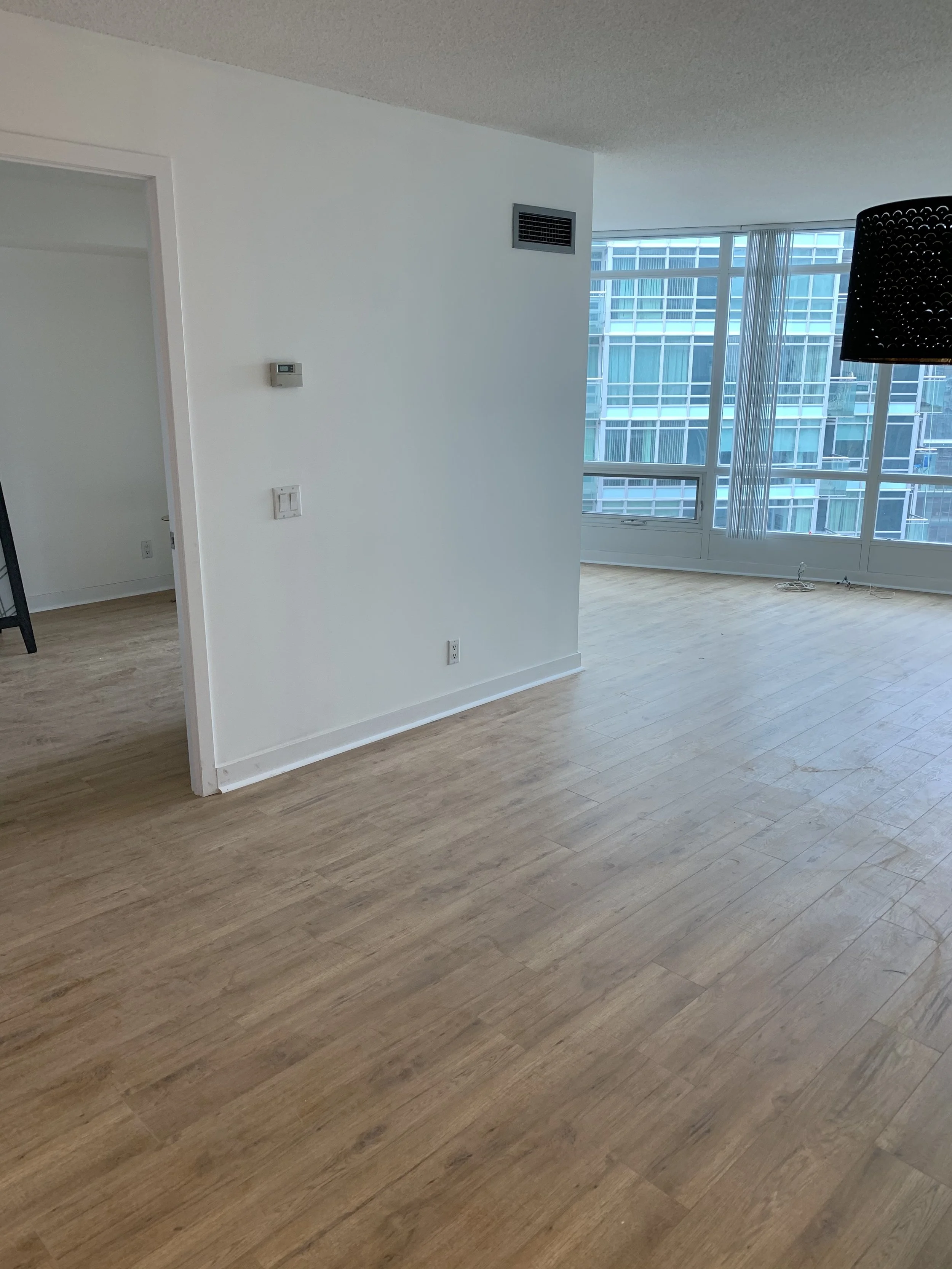 Painted walls and fresh floor in a renovated rental