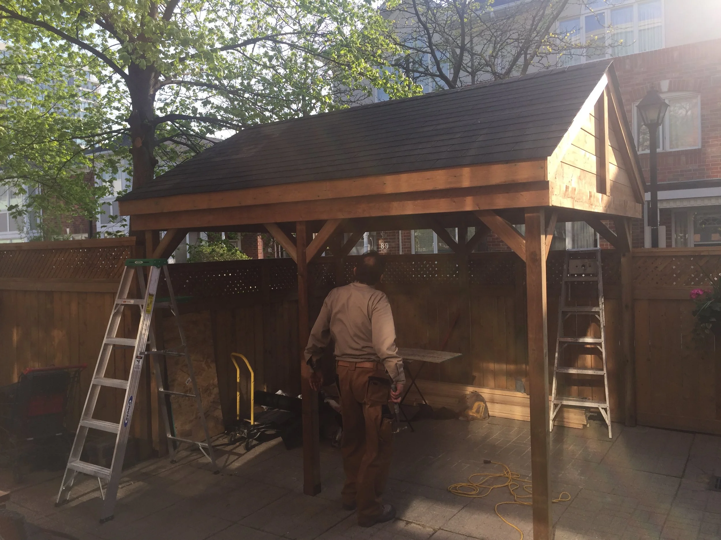 Thornhill wooden Gazebo and Fence in backyard