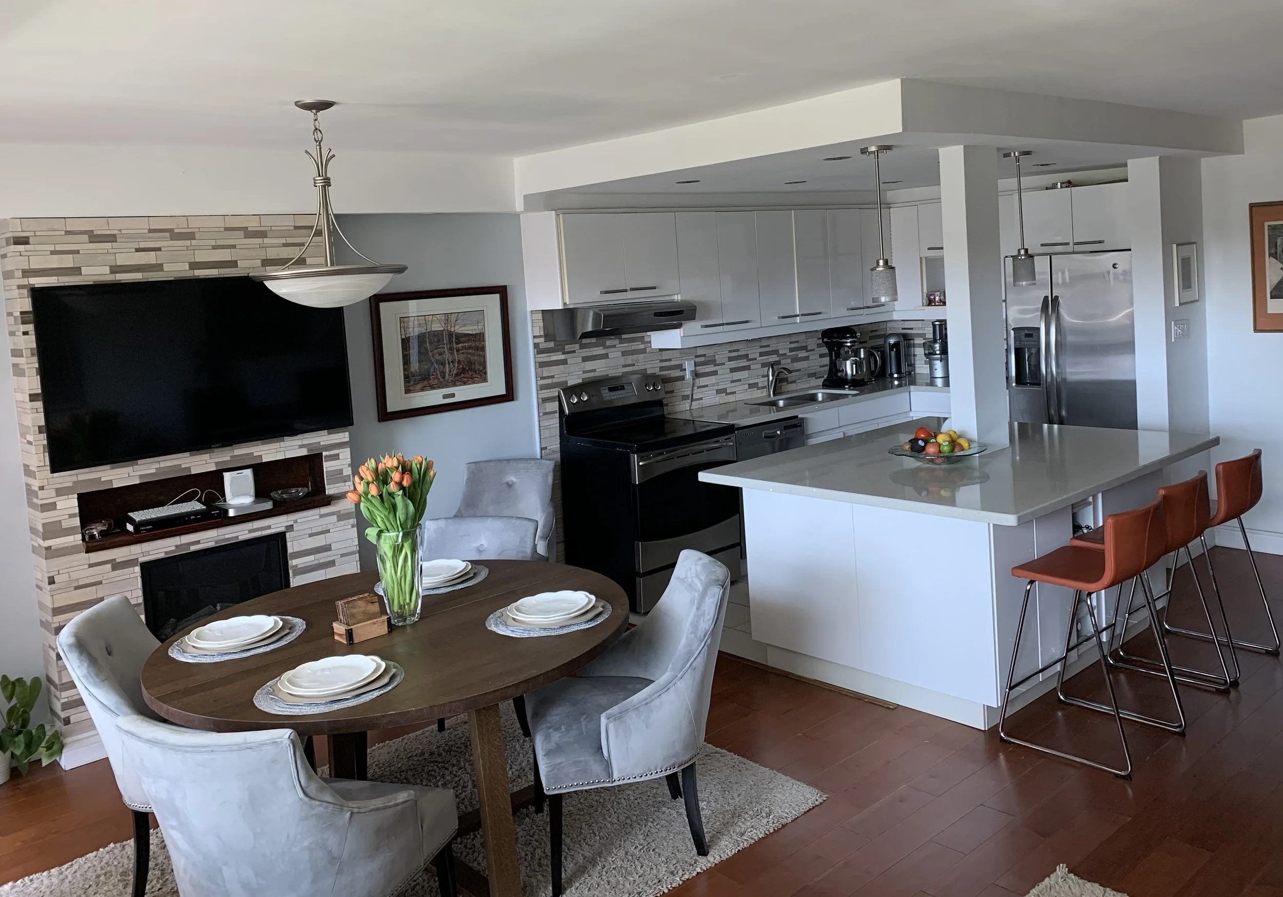 Renovated condo with fireplace and TV