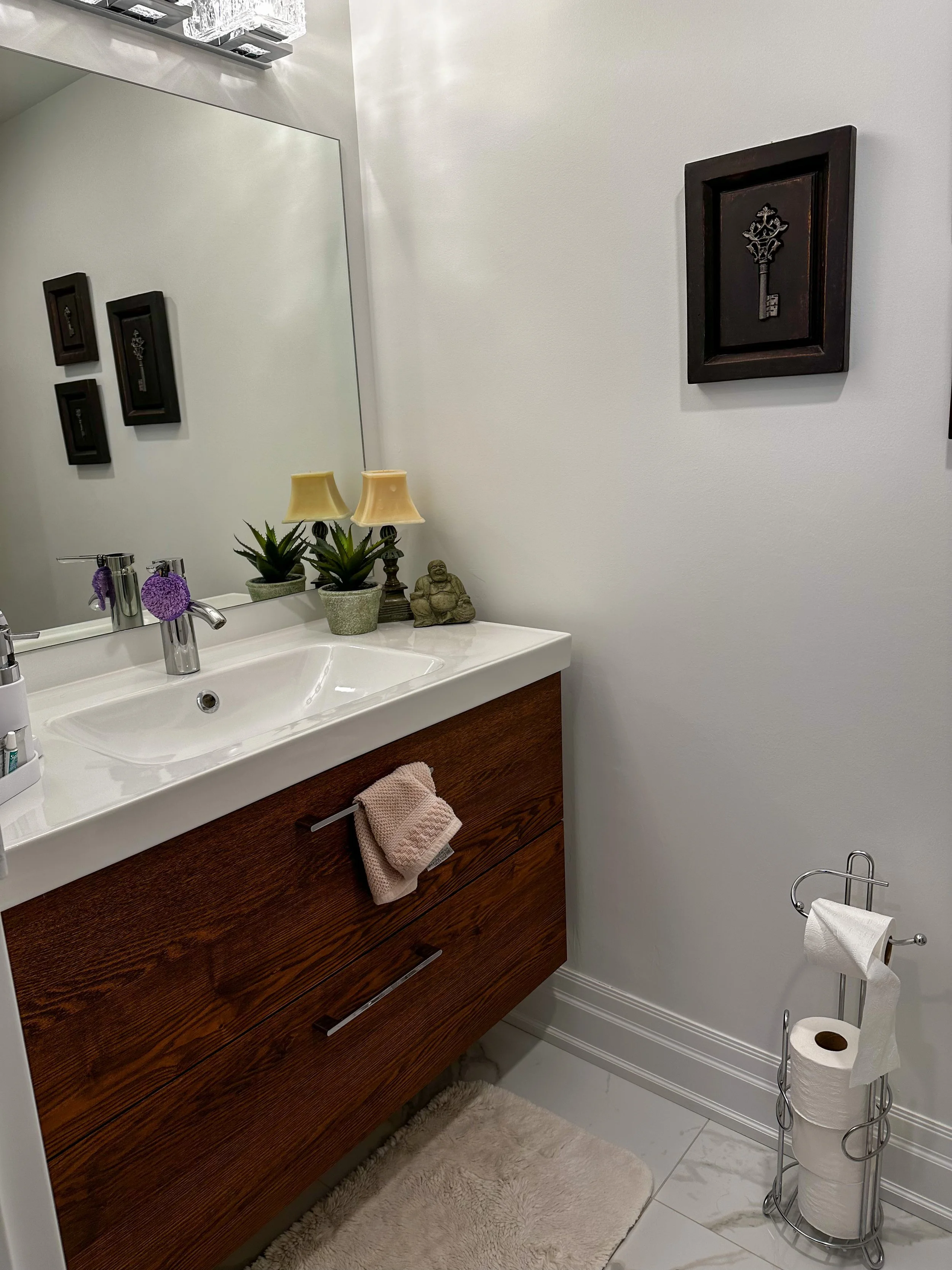 Bathroom with a brown vanity