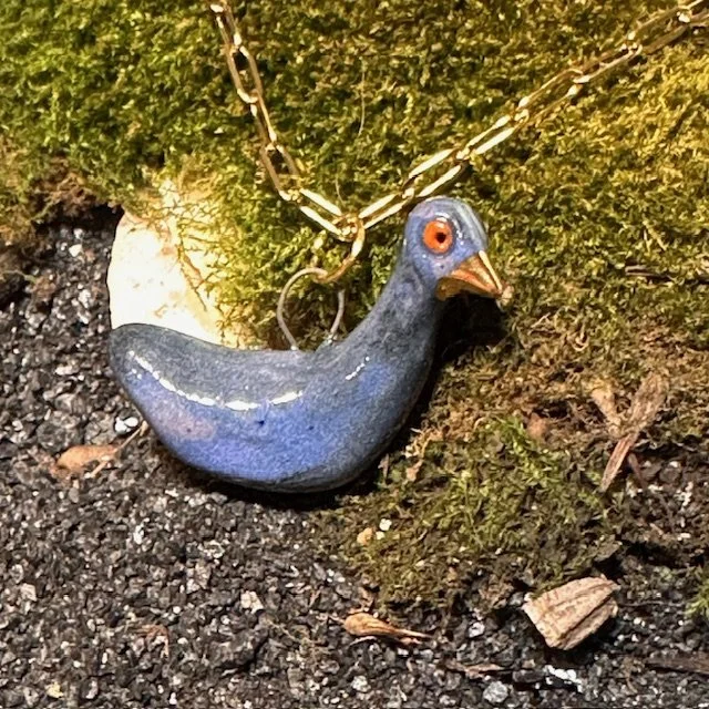 Gold tipped NYC Pigeon pendant