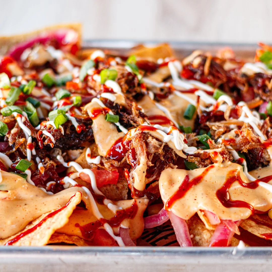 Nacho cheese, pulled pork, and all the fixin&rsquo;s&mdash; y'all know that's how we do National Nacho Day! 🧀🌶️ ⁠
#PuckettsEats #NationalNachosDay #BBQNachos ⁠#nachos⁠