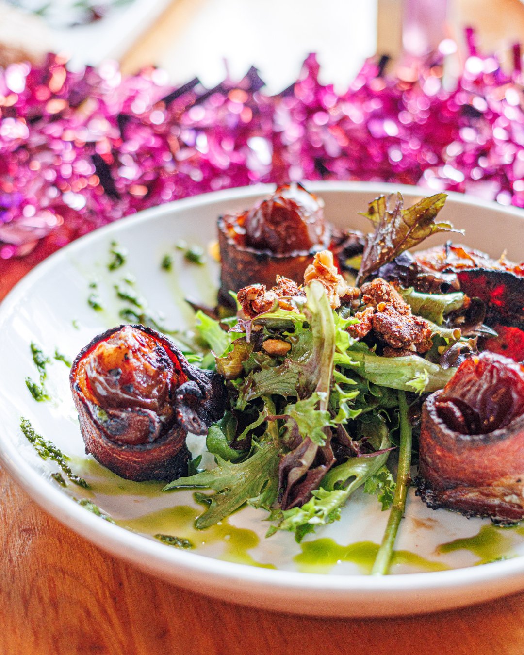 Happy National Bacon Day! 🎉🥓 Celebrate with our mouthwatering bacon-wrapped dates: the ultimate sweet and savory bite!  But hurry&mdash;these delicious bites are only sticking around for a little while longer with our Hard Candy Christmas menu endi
