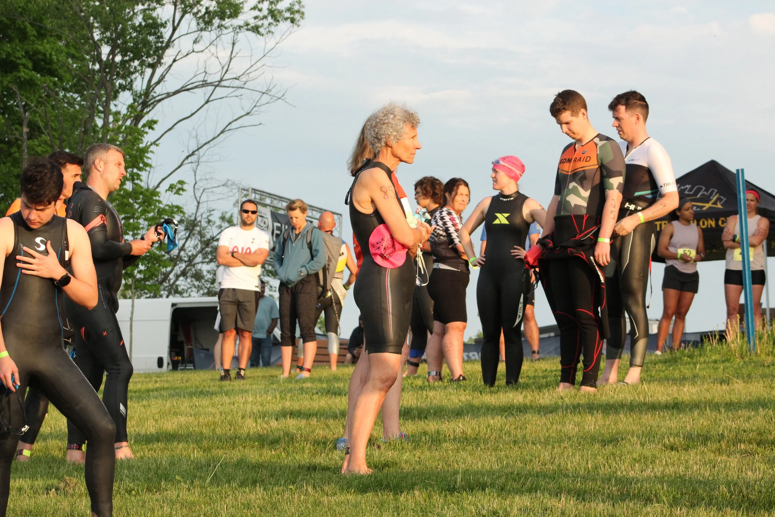 Athletes in wetsuits before the Mighty Moraine swim