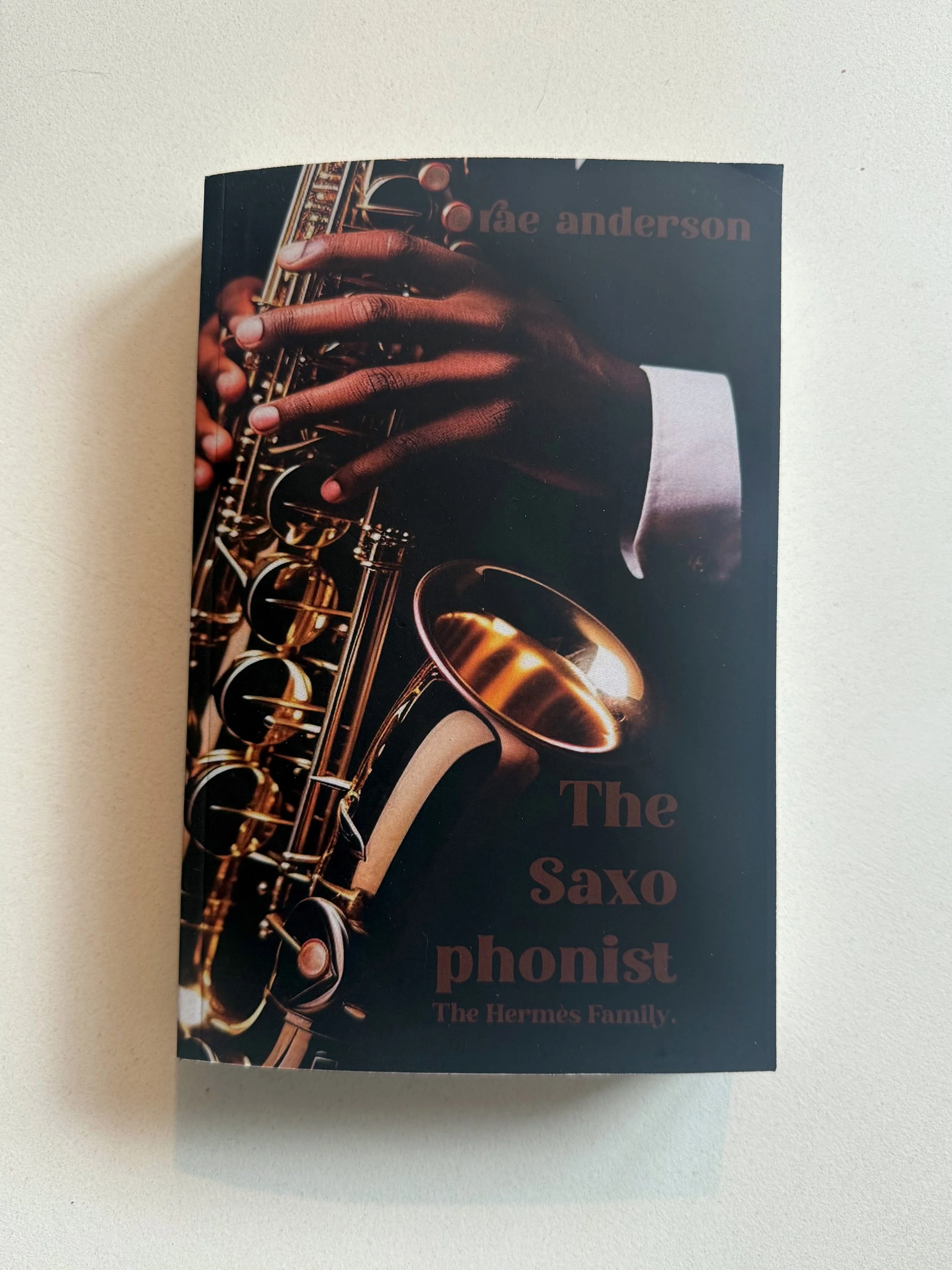 The Saxophonist—Signed paperback