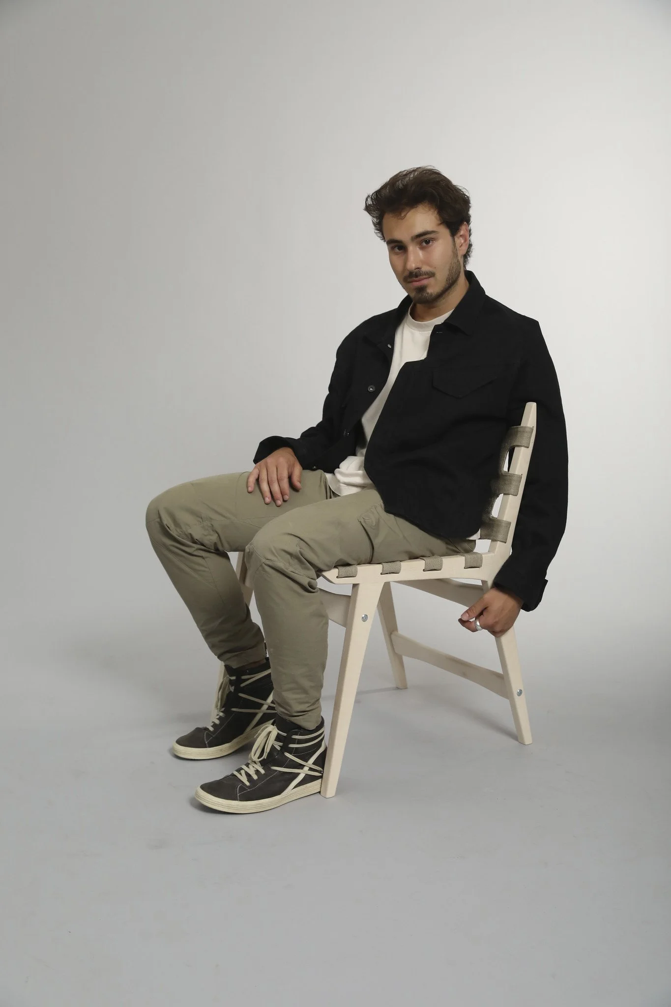 Nick Lankau sitting in Arbori chair