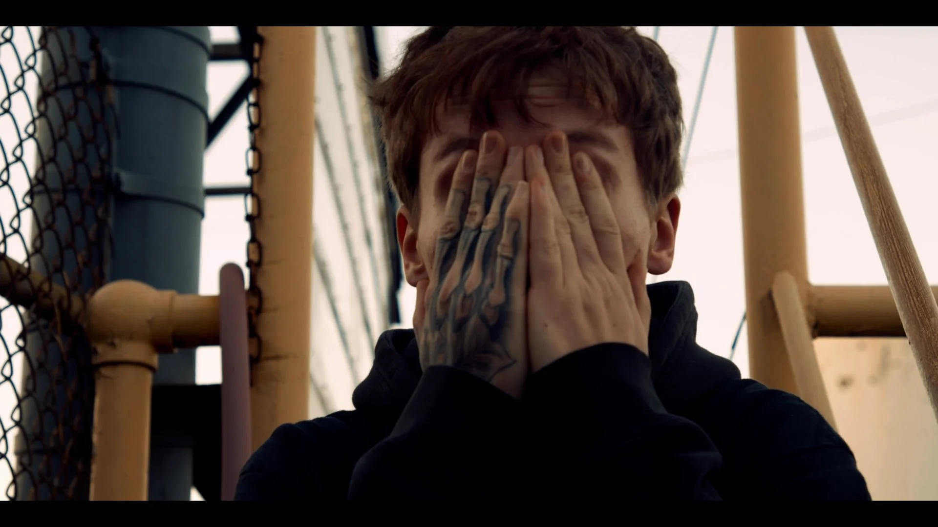 alex rubbing face.jpg