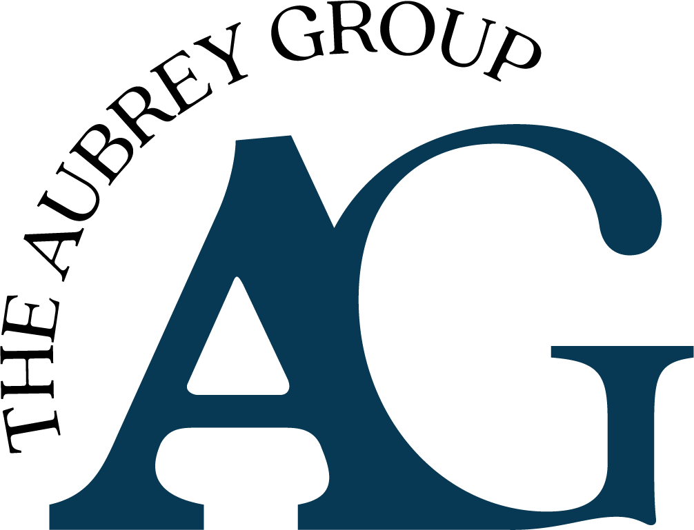 Black and Dark Blue Logo with the words The Aubrey Group and a large letter A and large letter G