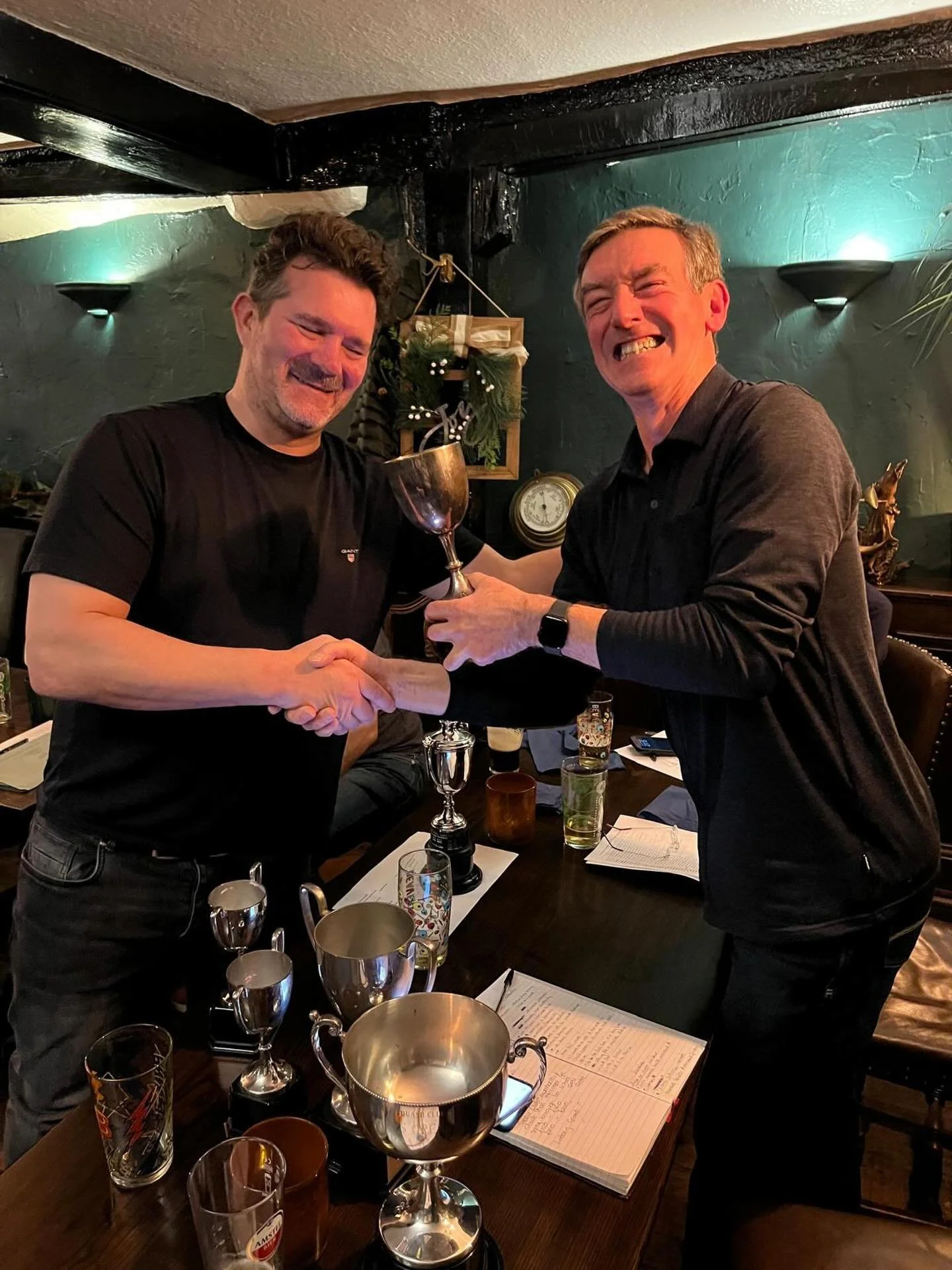 Lee Hector (left) receiving the Pyle Trophy from Paul Blackmore ( league coordinator  aka Wallace from this cheesy grin)at Oundle Squash Clubs awards and agm at The Ship Inn.  Well done Lee.