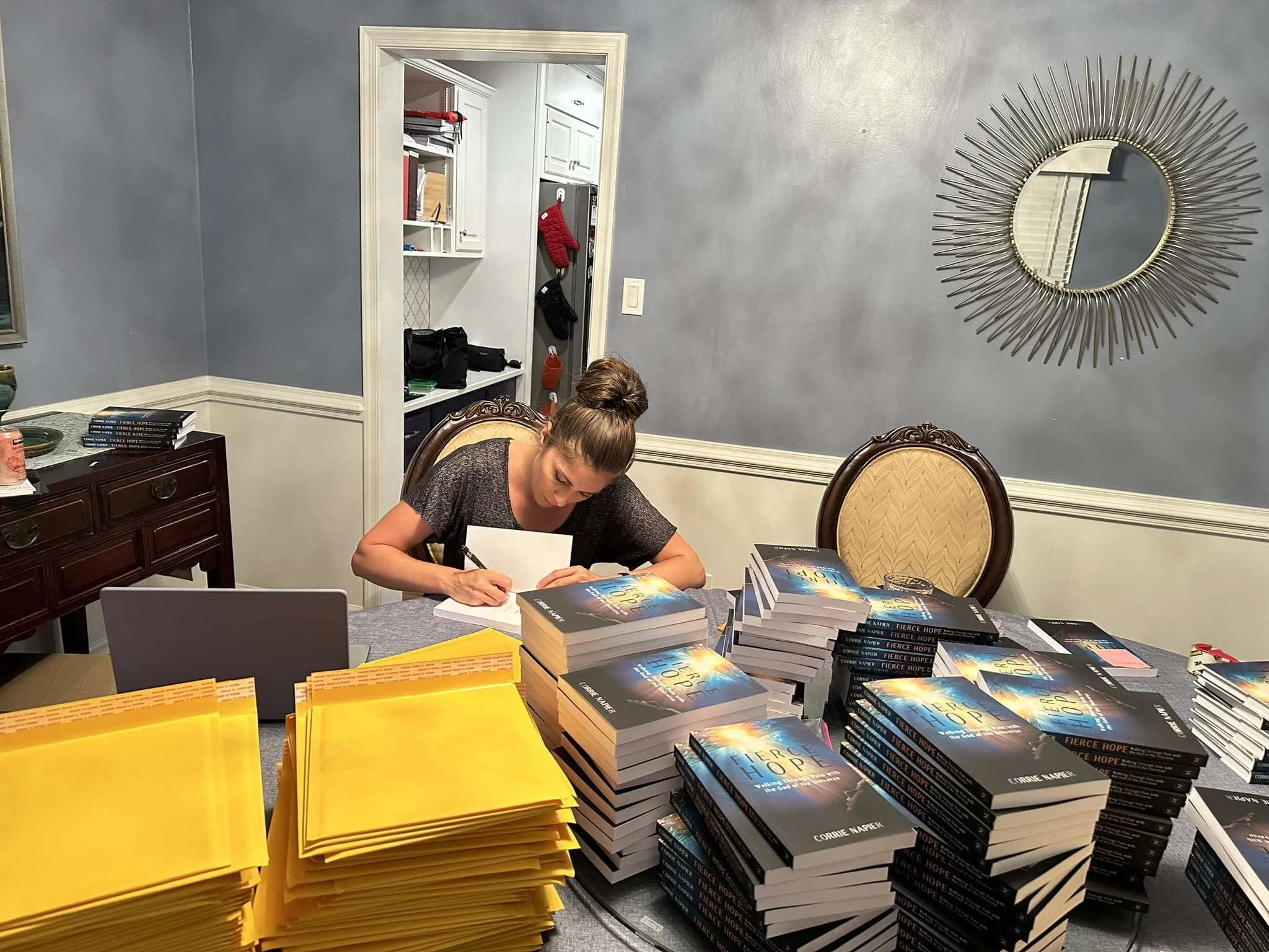 Copy of FEATURE - signing books.jpg