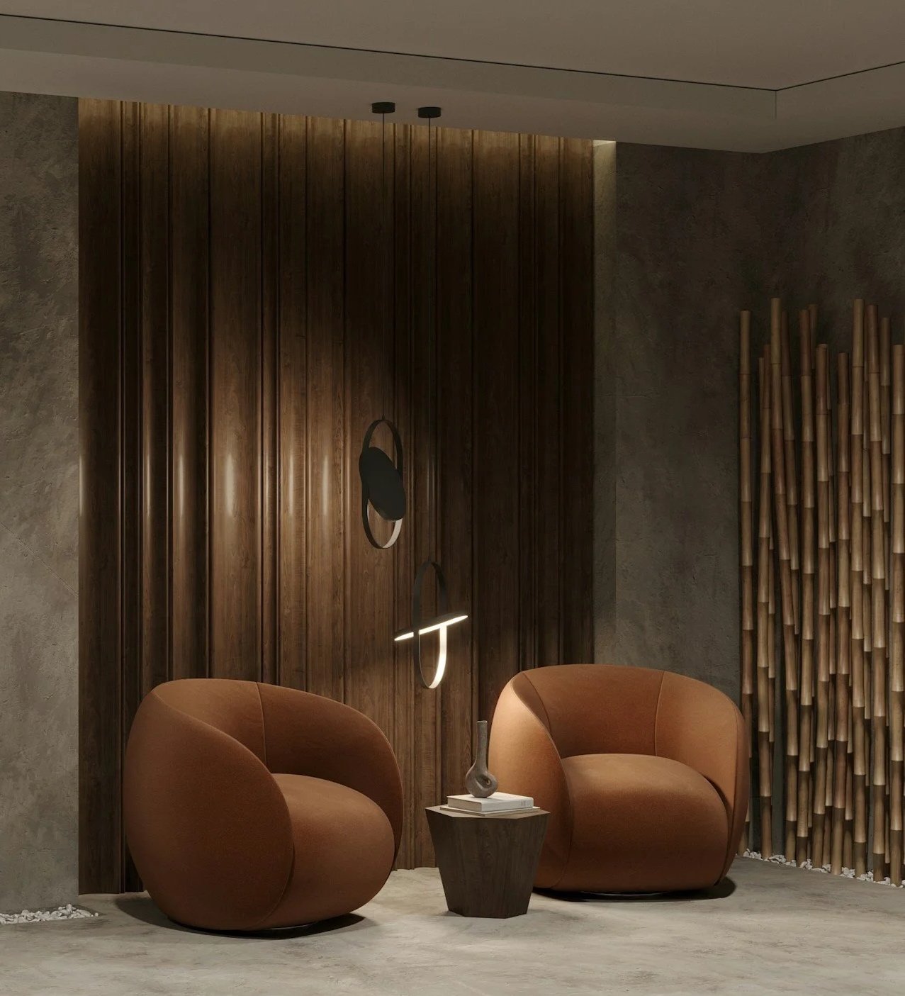 Woman with brown hair smiling and sitting on a white sofa in a casual setting.