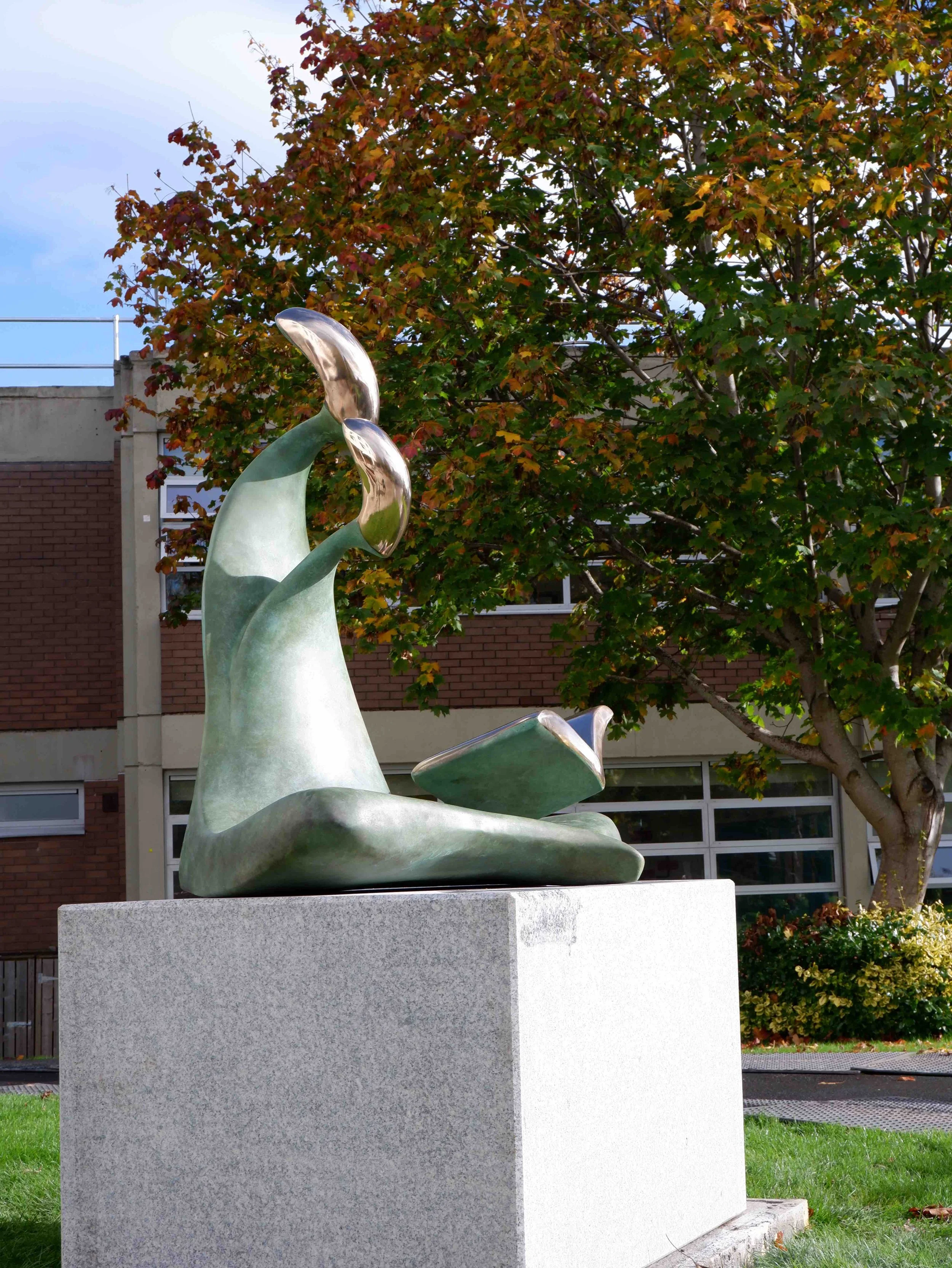 Nuture-sculpture-sandra-bell-irish-cast-bronze-unveiling-taoiseach-leo-varadkar-alexandra-college-dublin-art-represents-teacher-student-holding-book-essence-learning-honor-teachers-in-art-metal-modern-sustainable-11.jpg