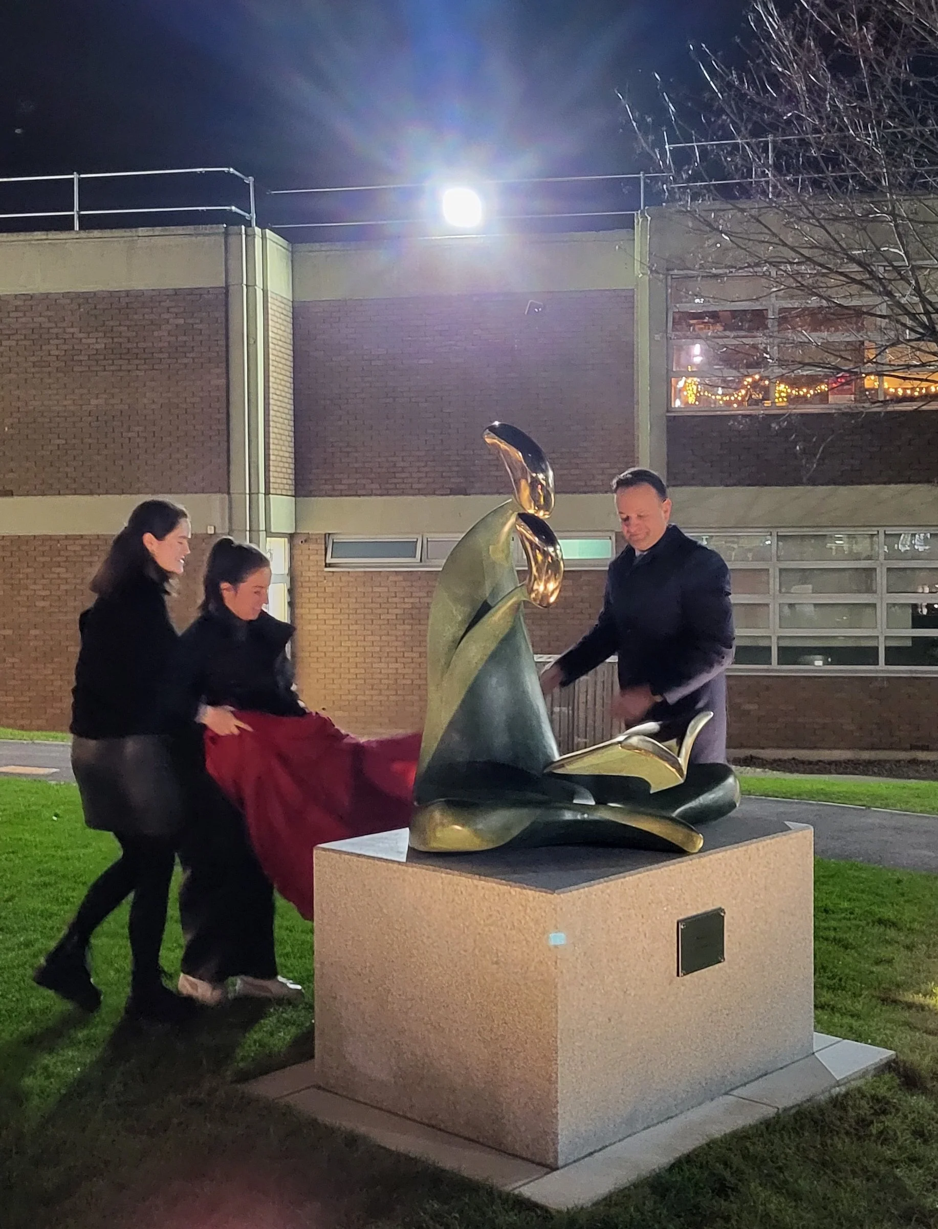 Nuture-sculpture-sandra-bell-irish-cast-bronze-unveiling-taoiseach-leo-varadkar-alexandra-college-dublin-art-represents-teacher-student-holding-book-essence-learning-honor-teachers-in-art-metal-modern-sustainable-LV1.jpg