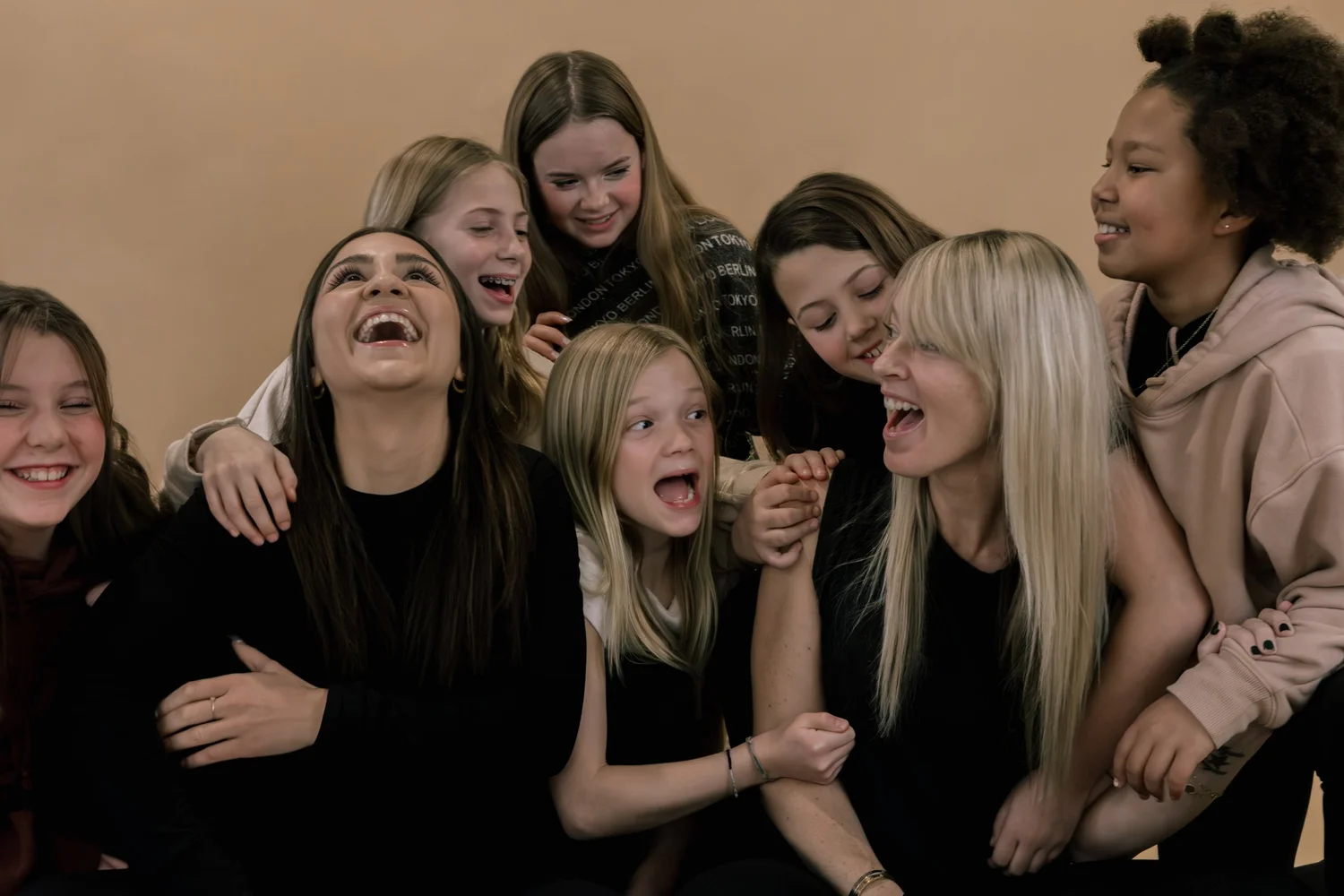 Girls laughing together in a group