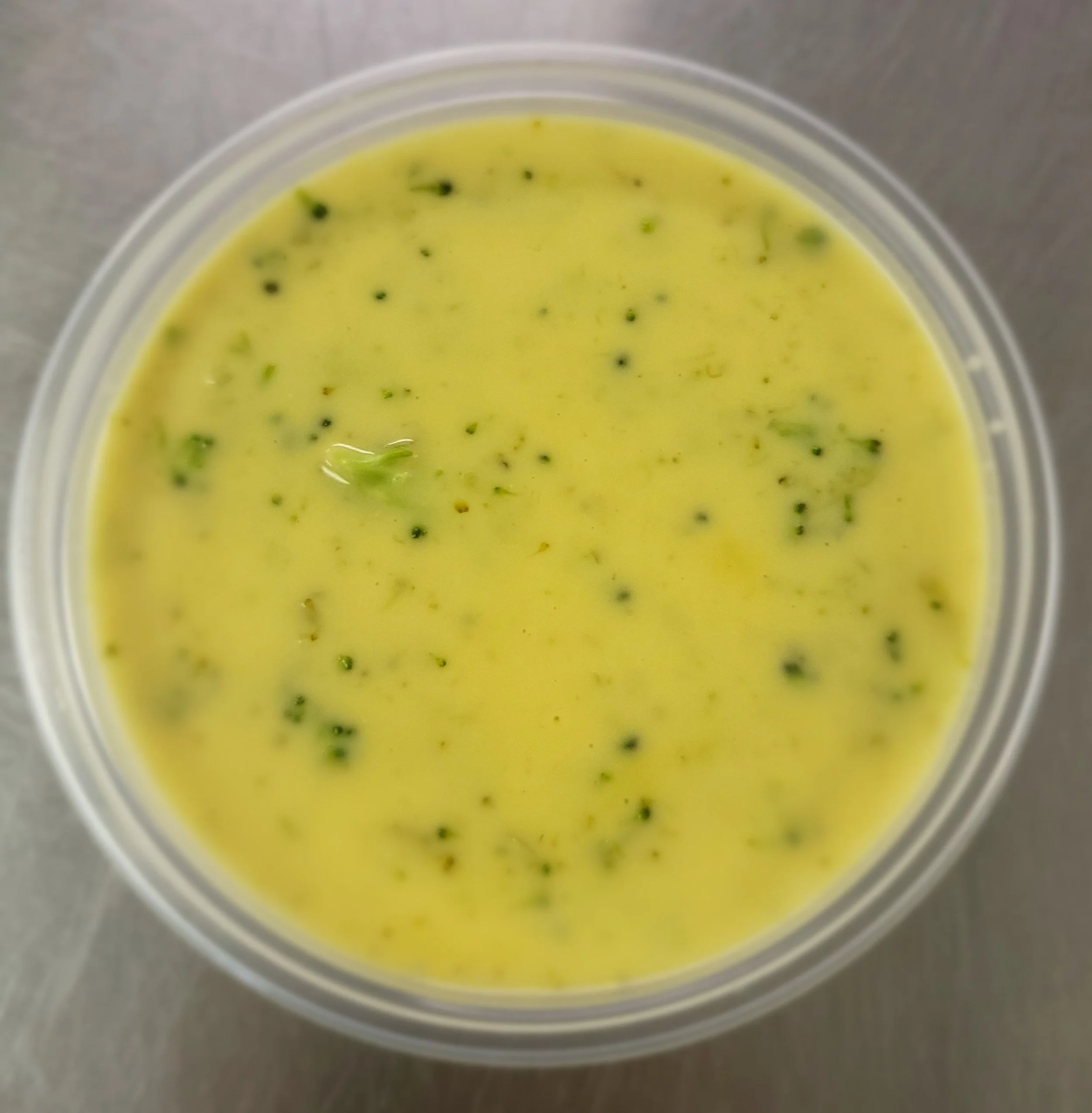 Cheddar Broccoli Soup. This soup has a perfect creamy consistency, loaded with broccoli, and very flavorful. It is sure to warm you on a chilly day. *Available during designated weeks*