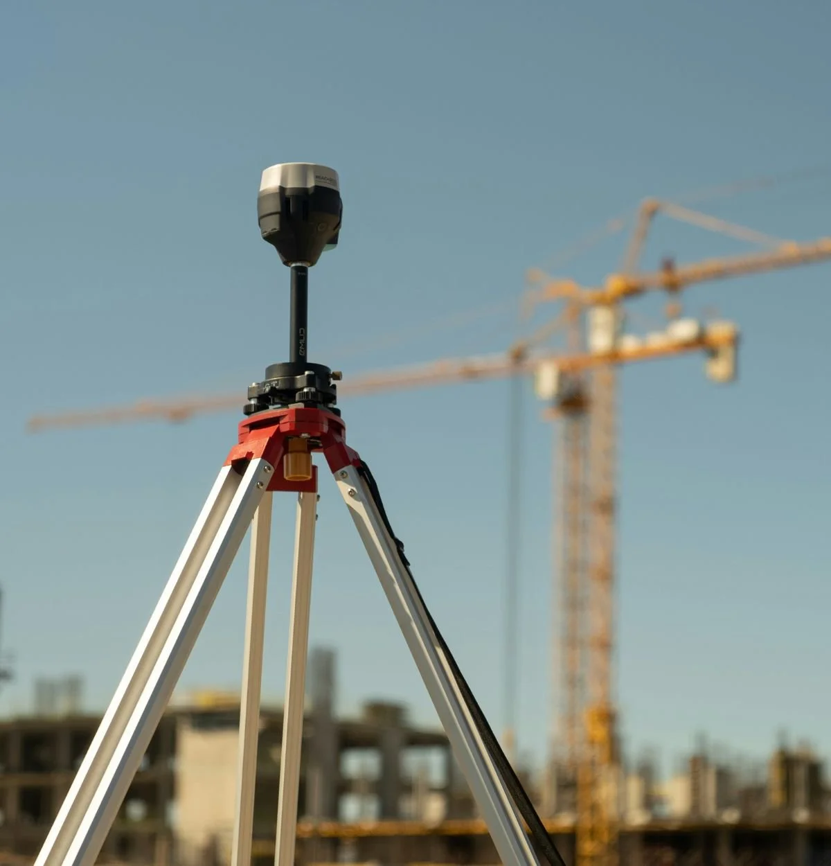 Surveying equipment at a property development site during site evaluation