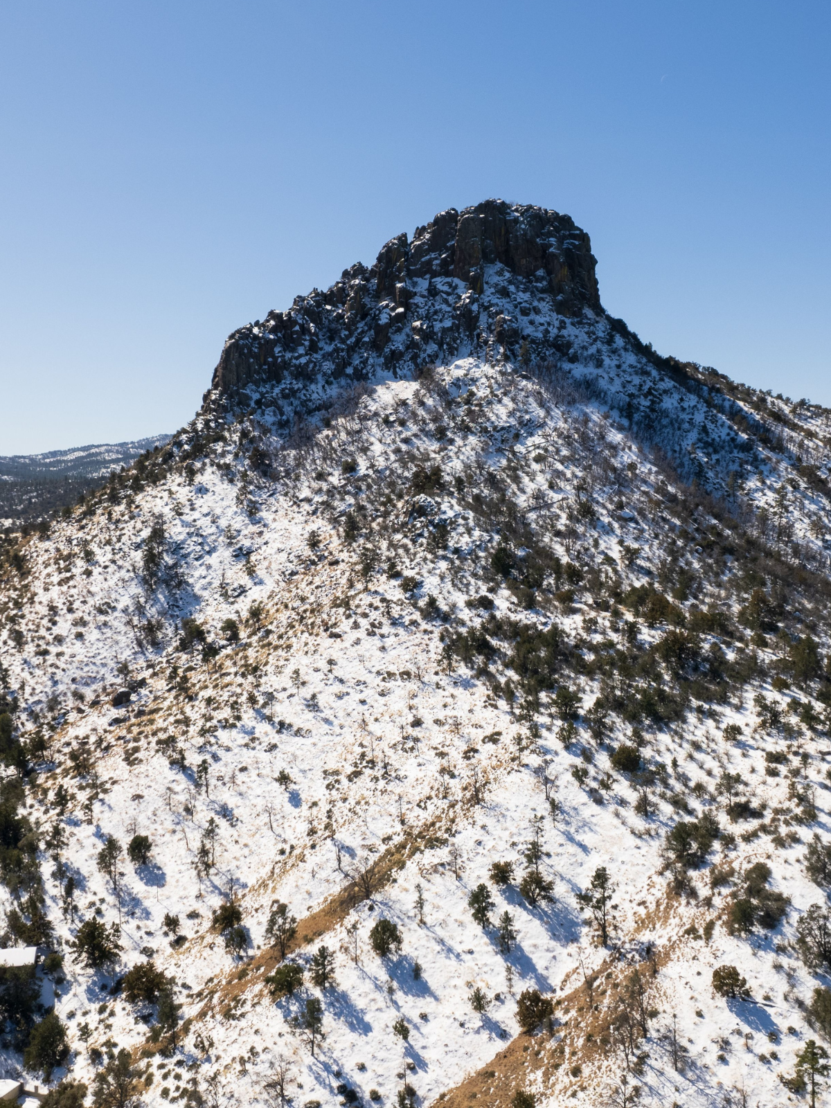 Snow-covered Thumb Butte near Prescott, Arizona