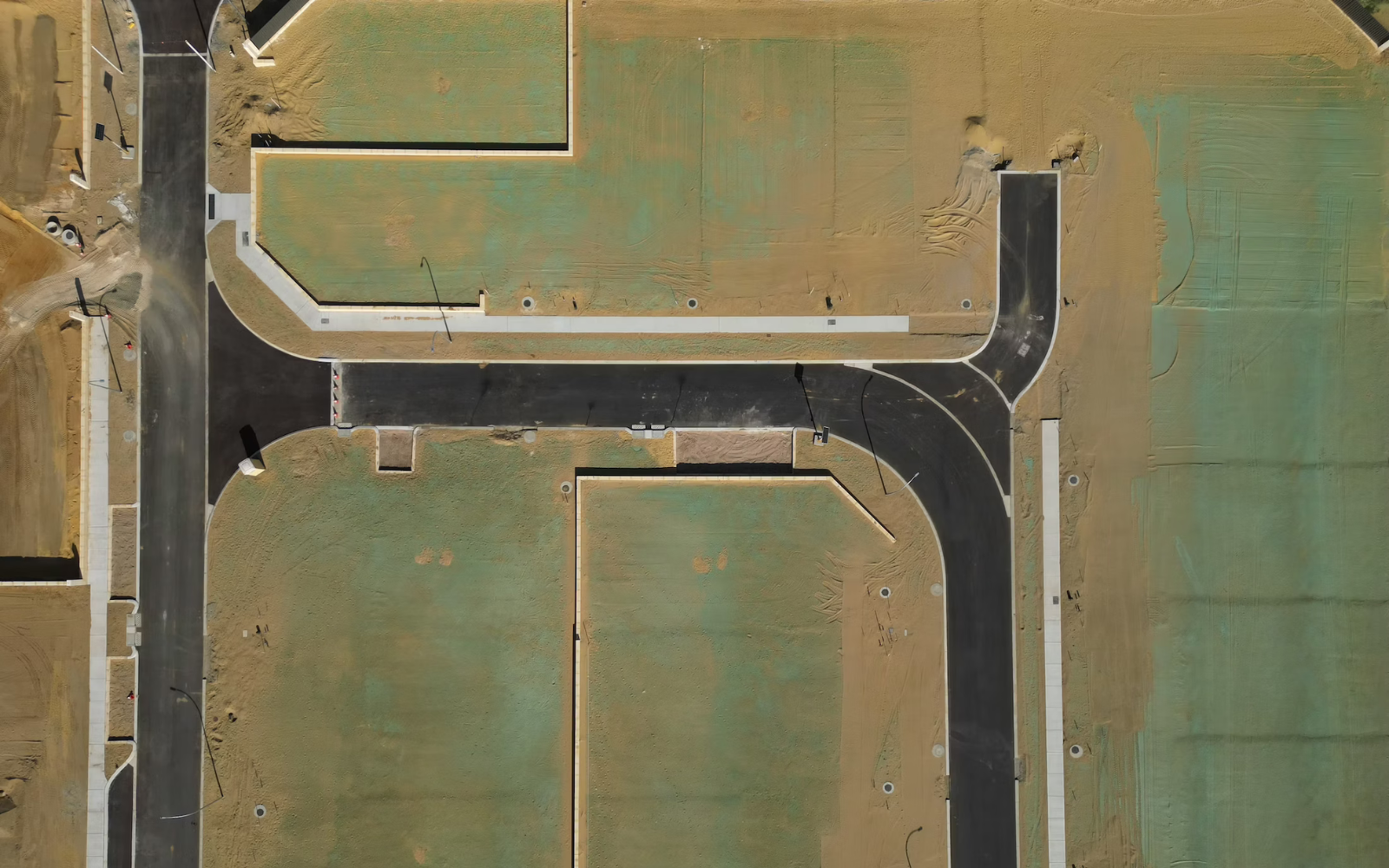 Aerial view of a development site illustrating commercial and community wastewater planning