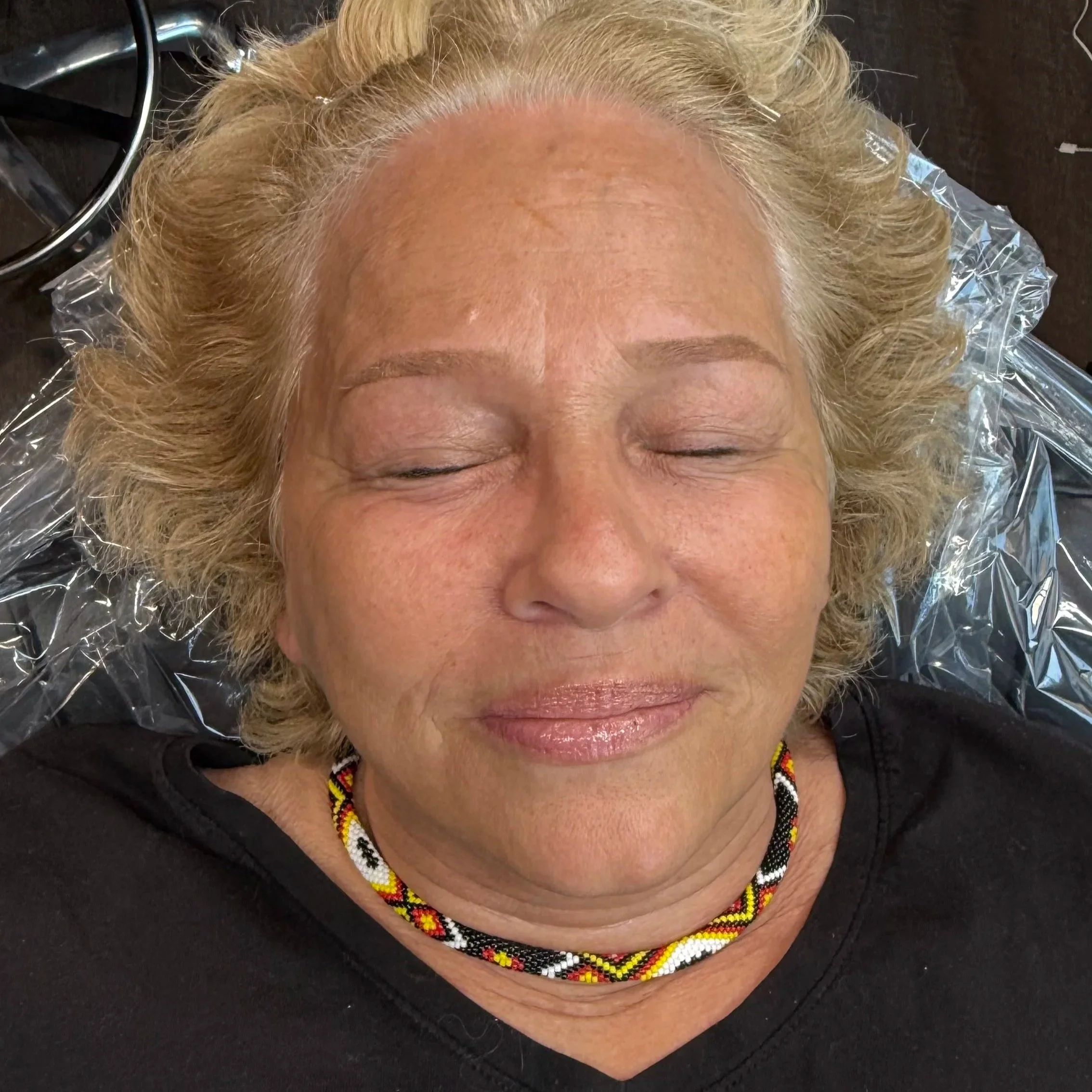 Close-up of a person's eye area showing before and after Permanent Makeup. Powder Brows. Nano strokes. Fairfax permanent makeup artist.