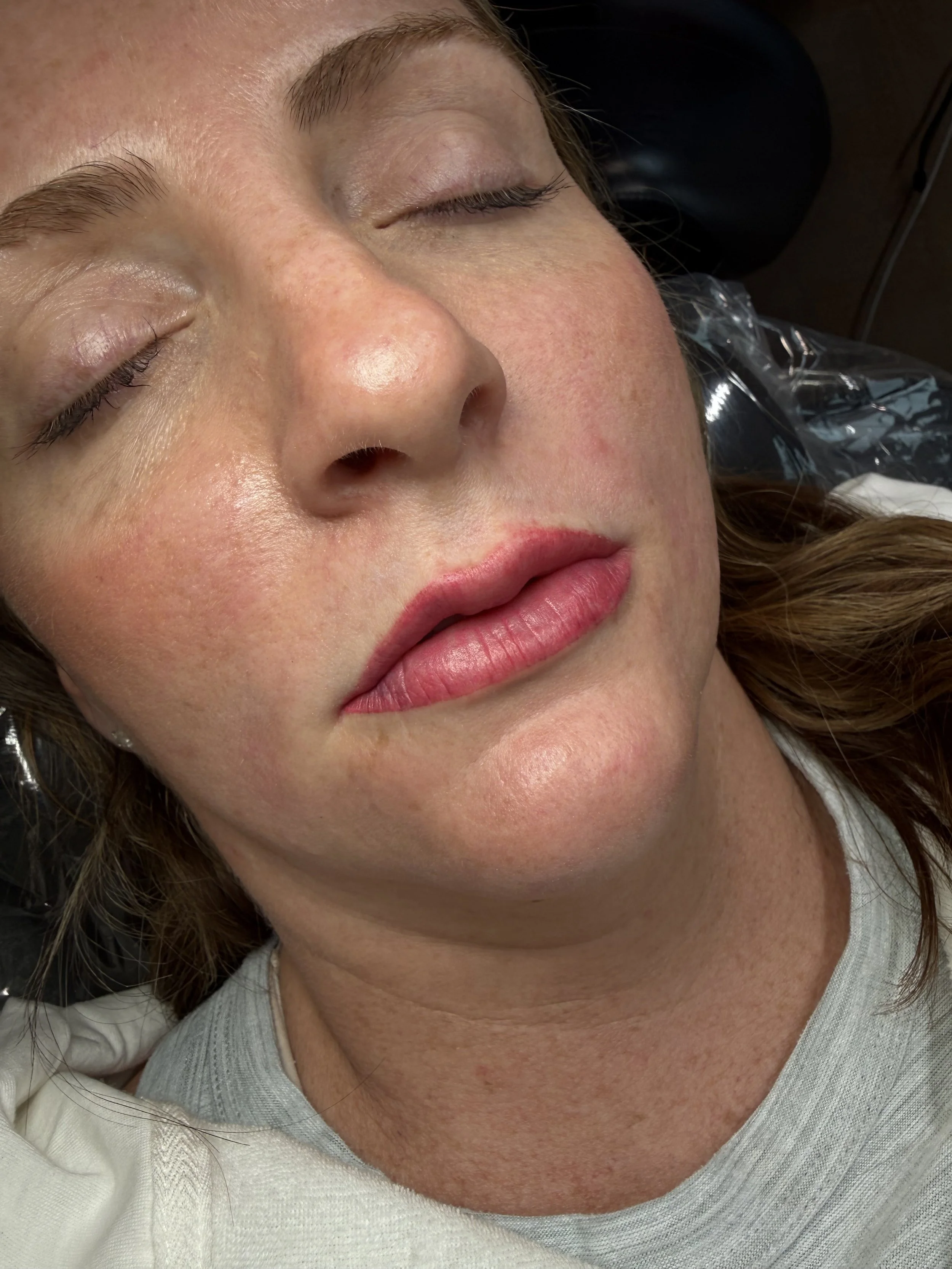 Close-up of a person's eye area showing before and after Permanent Makeup. Powder Brows. Nano strokes. Fairfax permanent makeup artist. Lip Blushing.