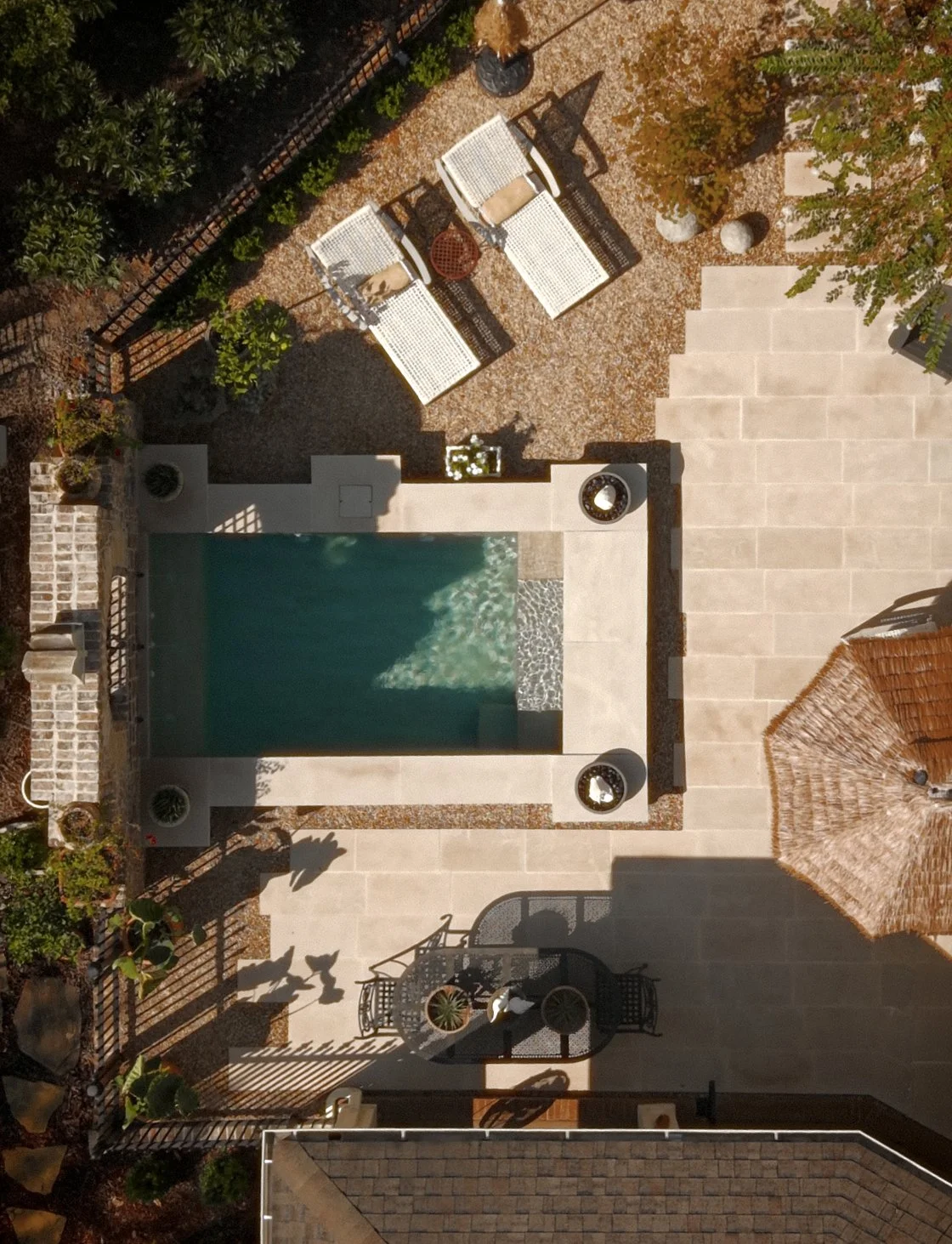 SPOOL POOL WITH TIMELESS BRICKWORK AND CLASSIC MIDWEST FARMHOUSE CHARM