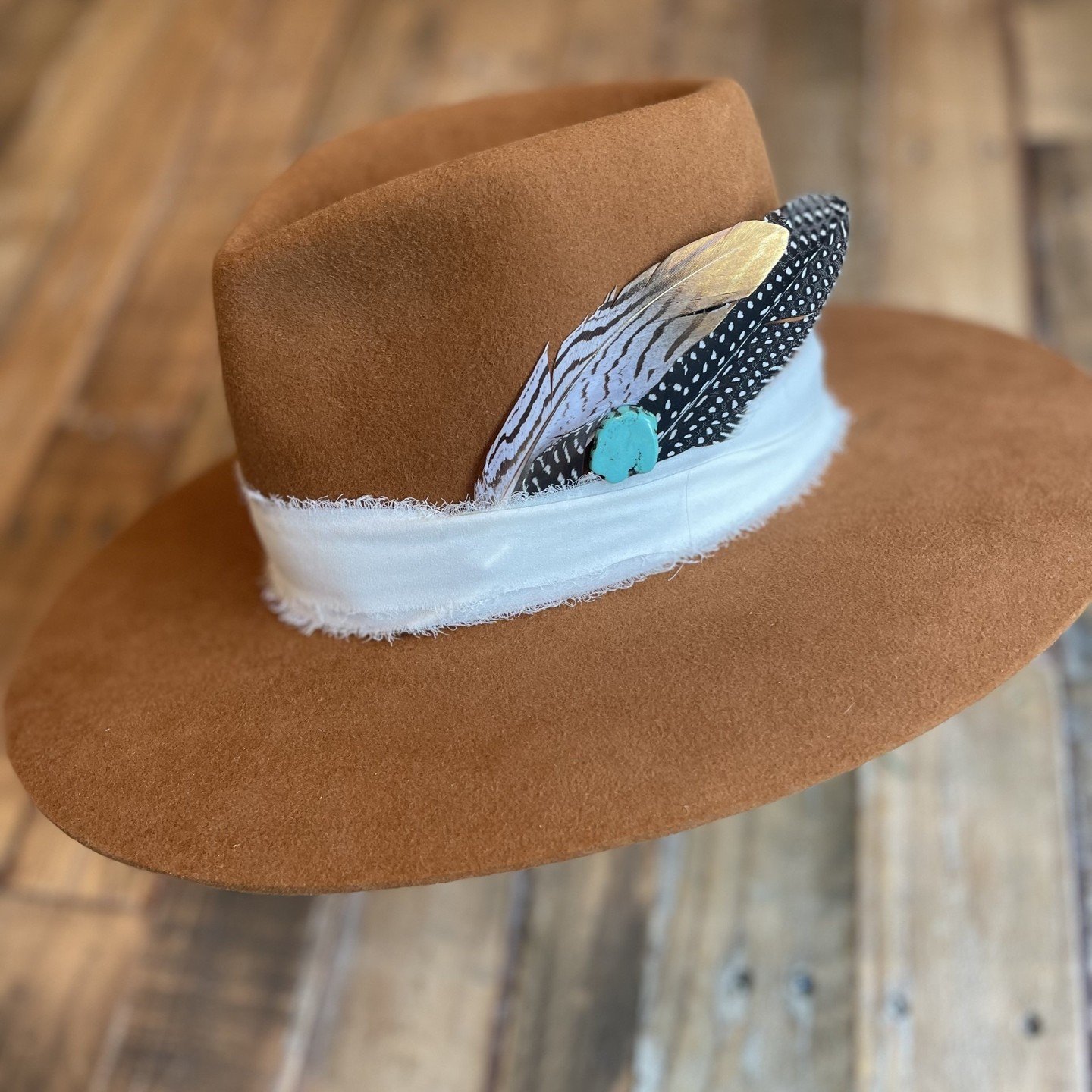 We're loving this rust color - with the pop of turquoise pin that can be worn year-round! This will be featured at the 2024 Garden Tour on May 7th (10-5pm) @ The San Francisco Yacht Club. Come shop our hat line!

https://www.marinhealthraccoons-garde