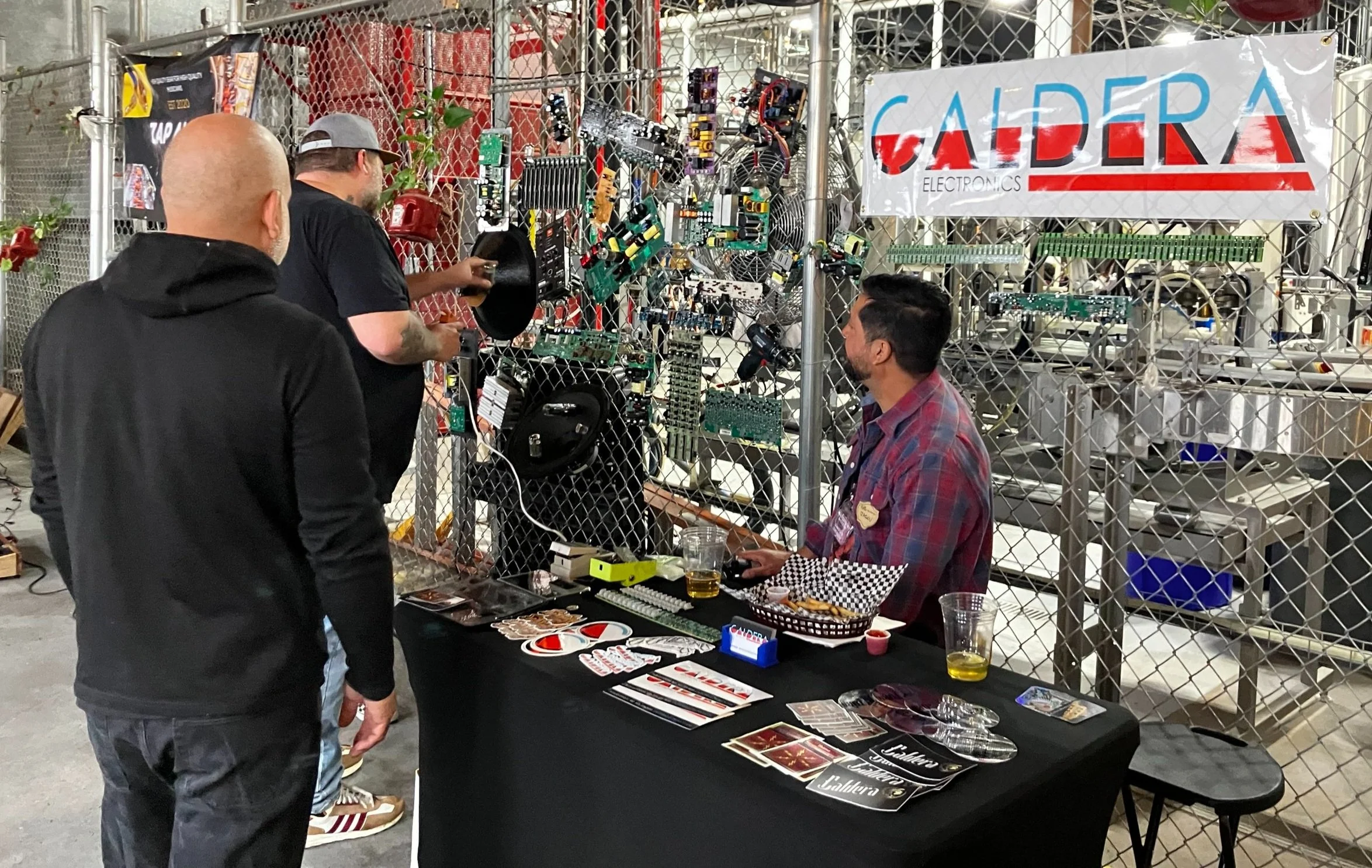 Caldera Electronics drew a lot of interest with their unique electronic waste wall art installation.