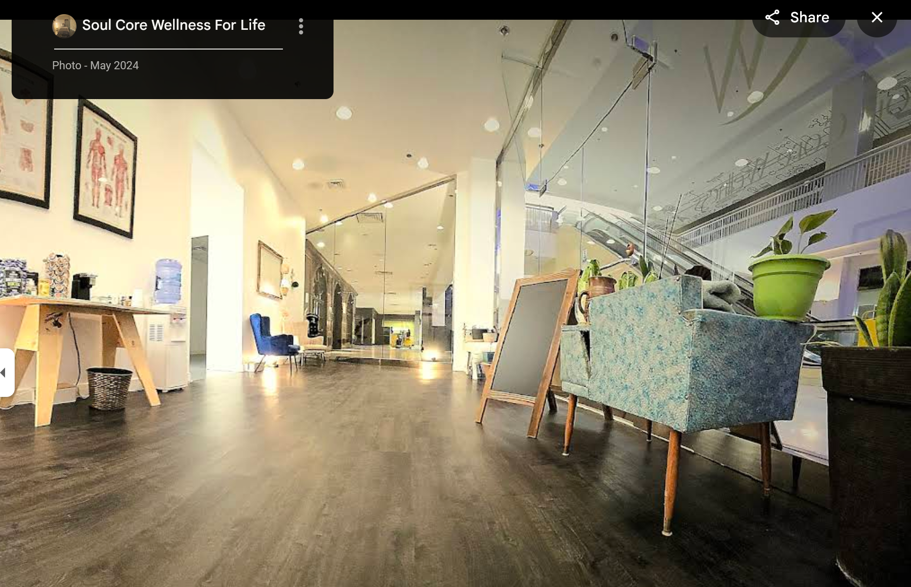 Welcome to the Lobby of Soul Core Wellness for Life. The glass windows offer a view into the lobby from the walkways. 